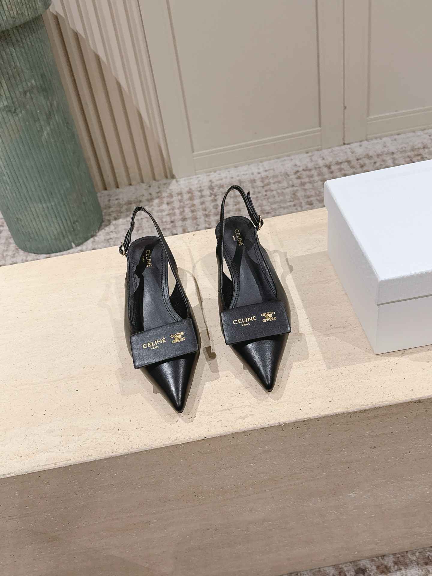 Celi New Pointed back strap with small high heels