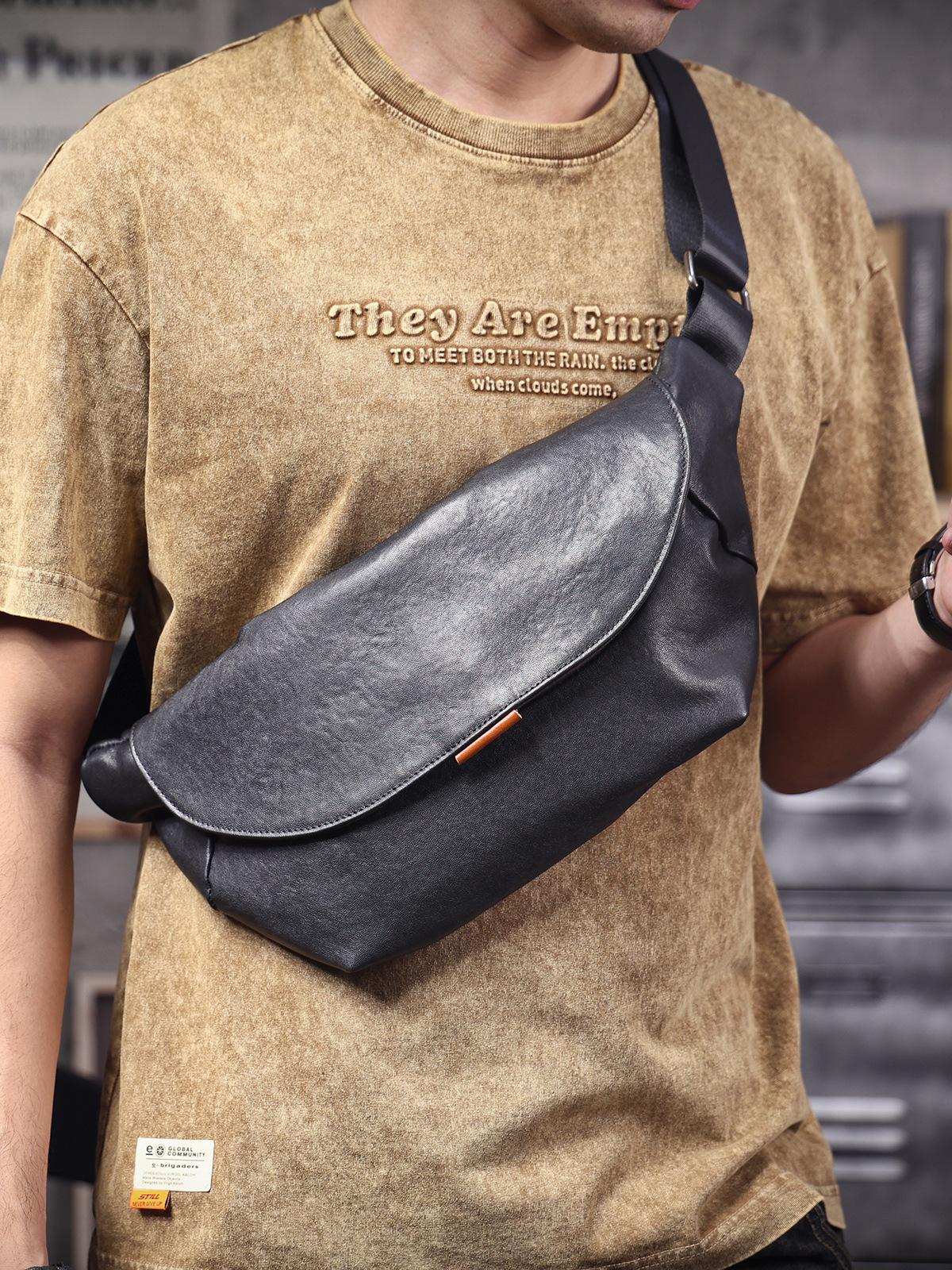 Sleek Black Leather Sling Bag - Minimalist Utility for the Modern Explorer