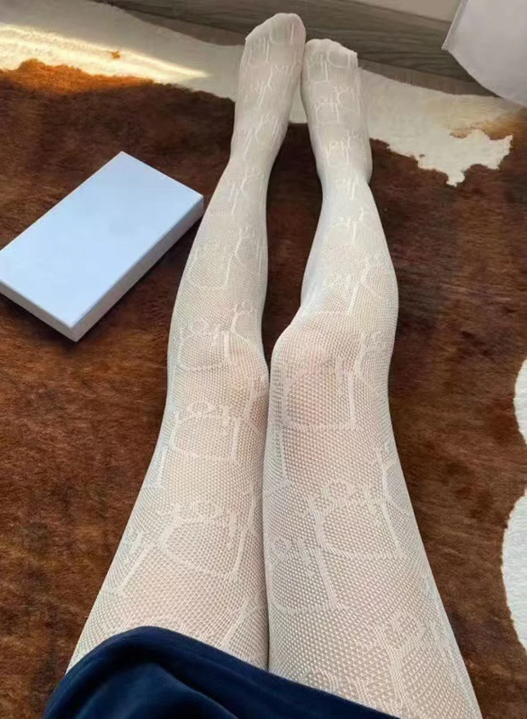 CD fishnet stockings with big D letter