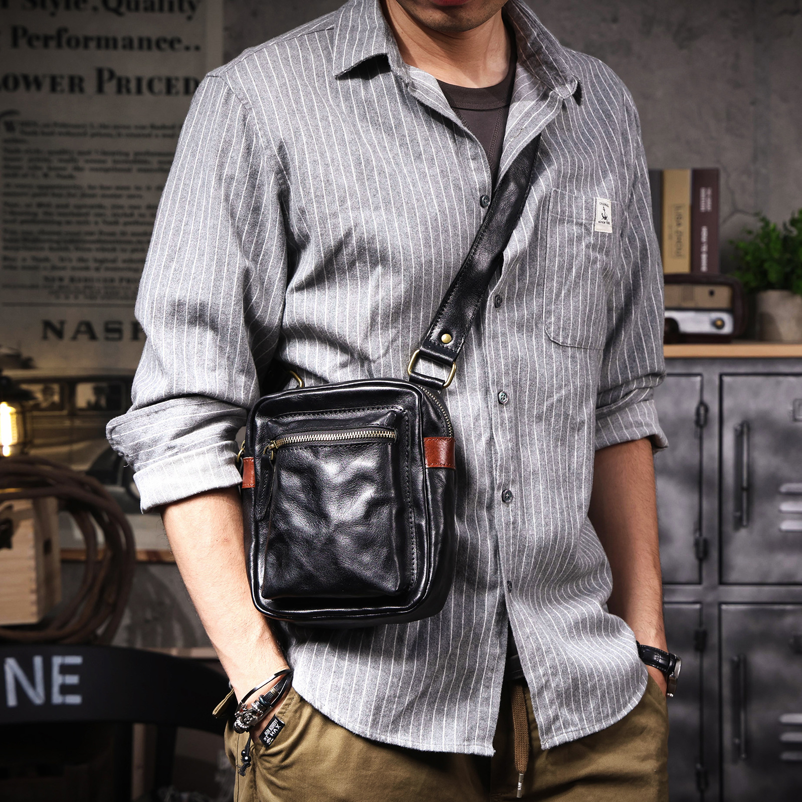 Sleek Black Leather Convertible Sling Bag - Compact Utility for Daily Carry