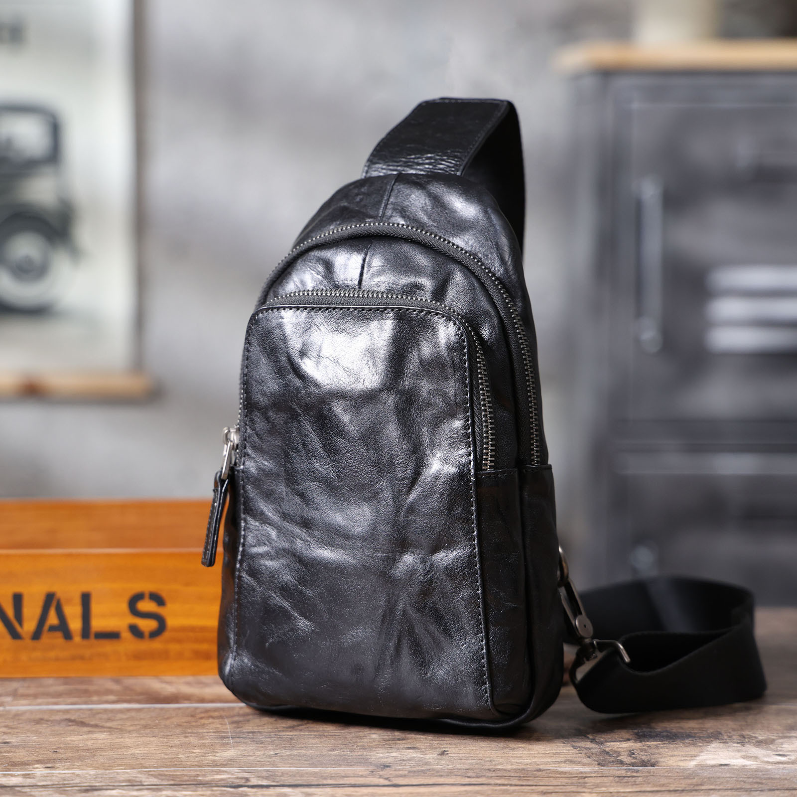 Sleek Crinkled Leather Sling Bag - Minimalist Utility for Daily Carry