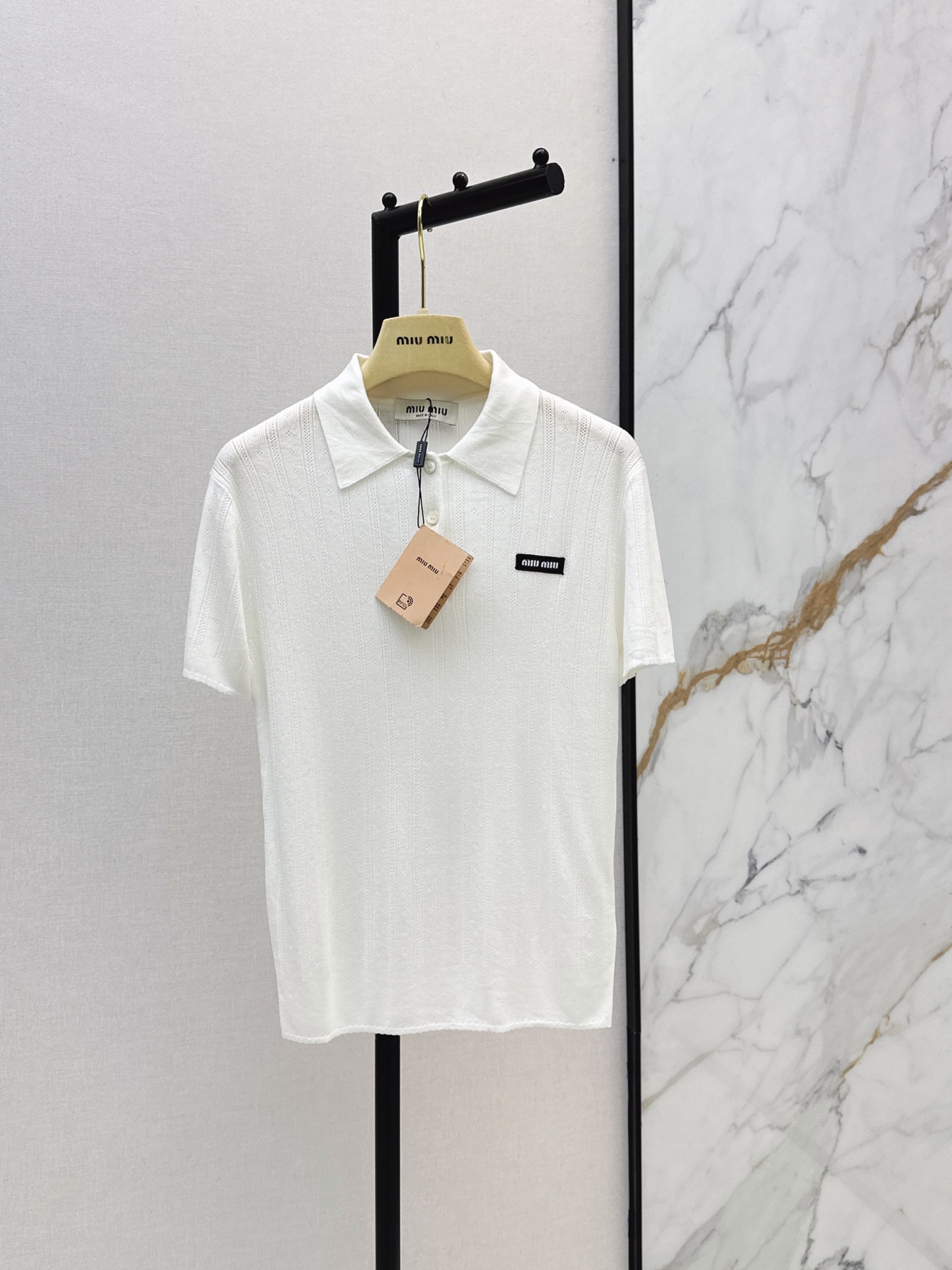 Miu New Polo knitwear