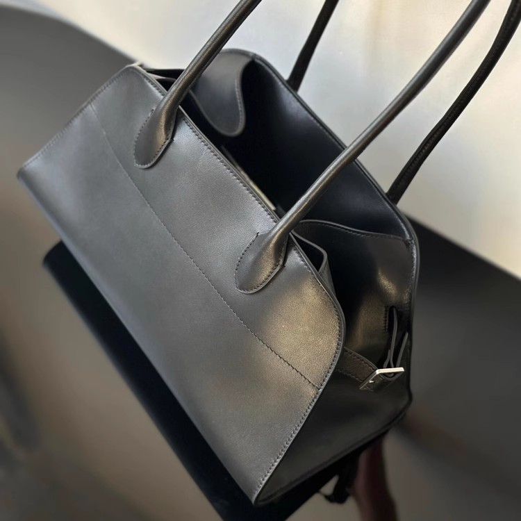 The Curved Top Suede Leather Satchel