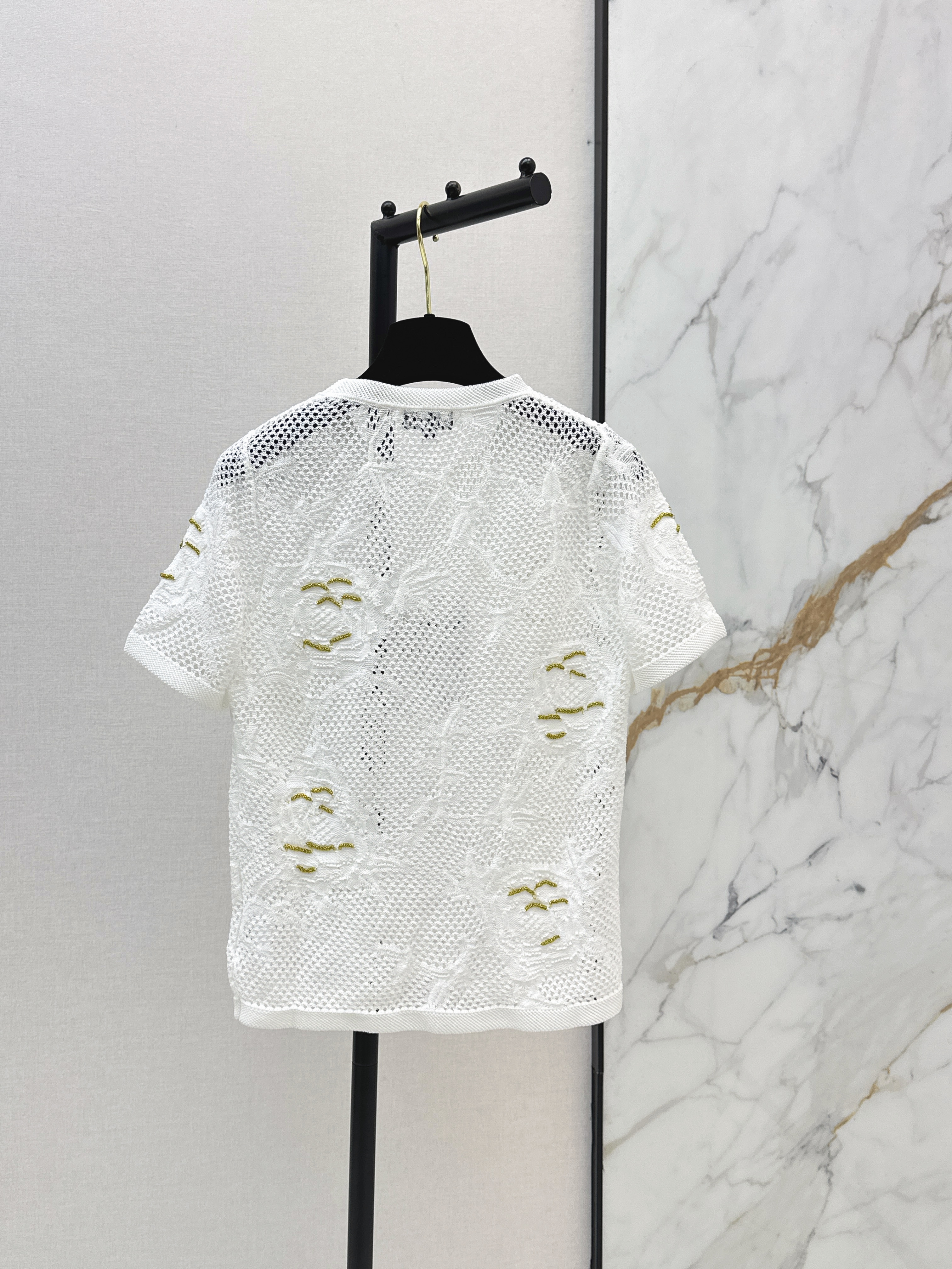 Chan New hollow knitwear