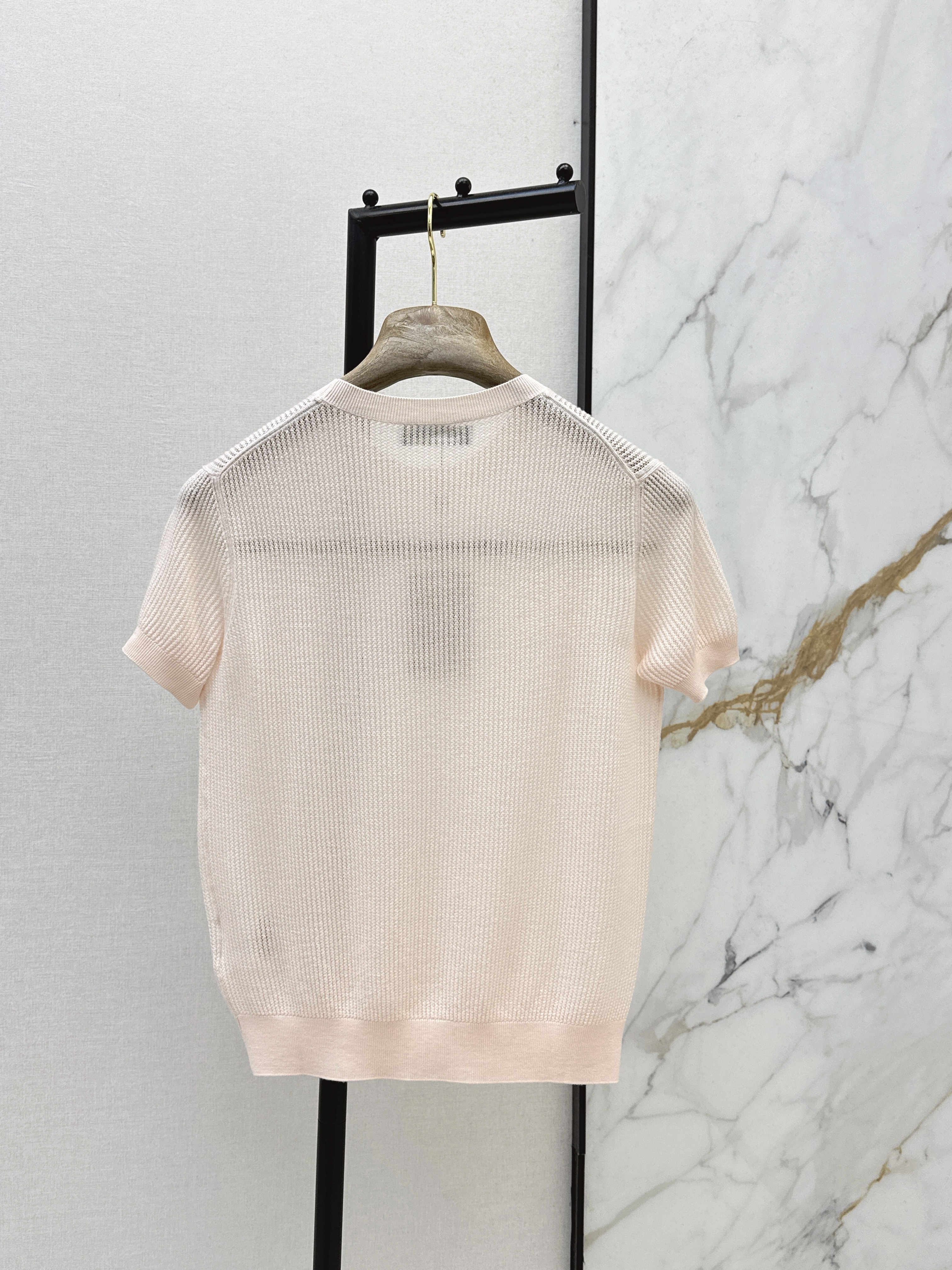 Loro New hollow knitwear