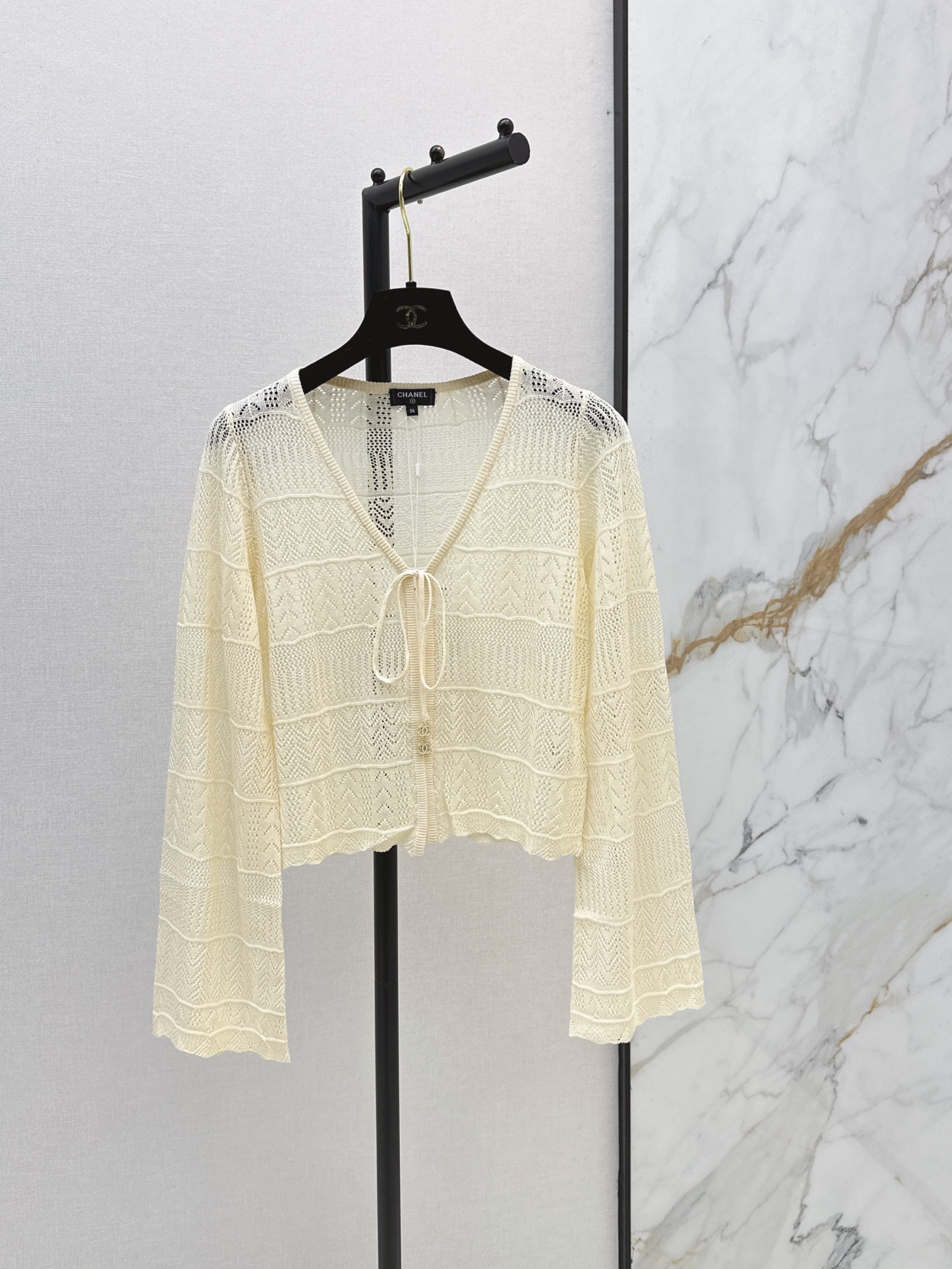 Chan New Hollow-out crochet cardigan
