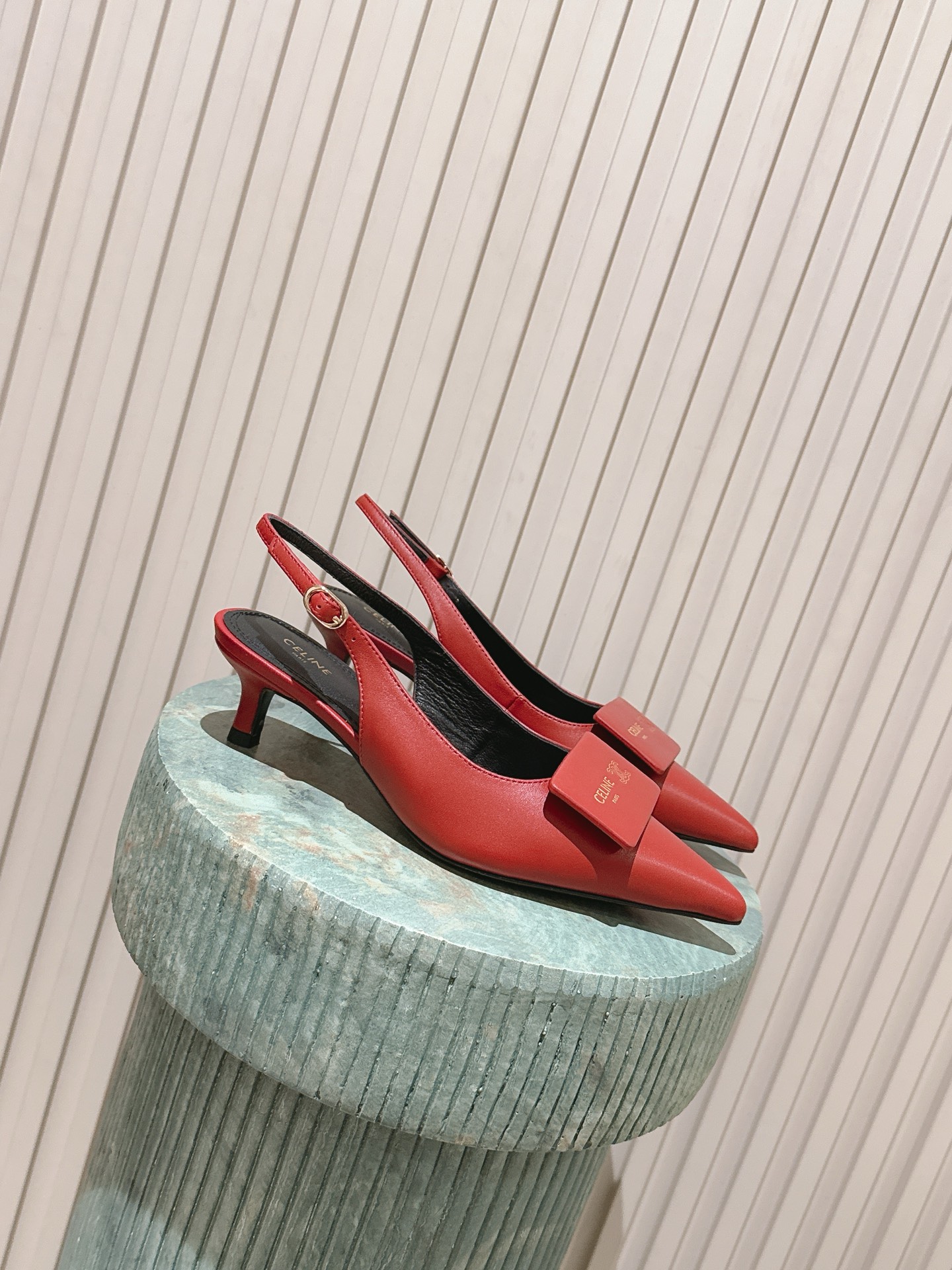 Celi New Pointed back strap with small high heels