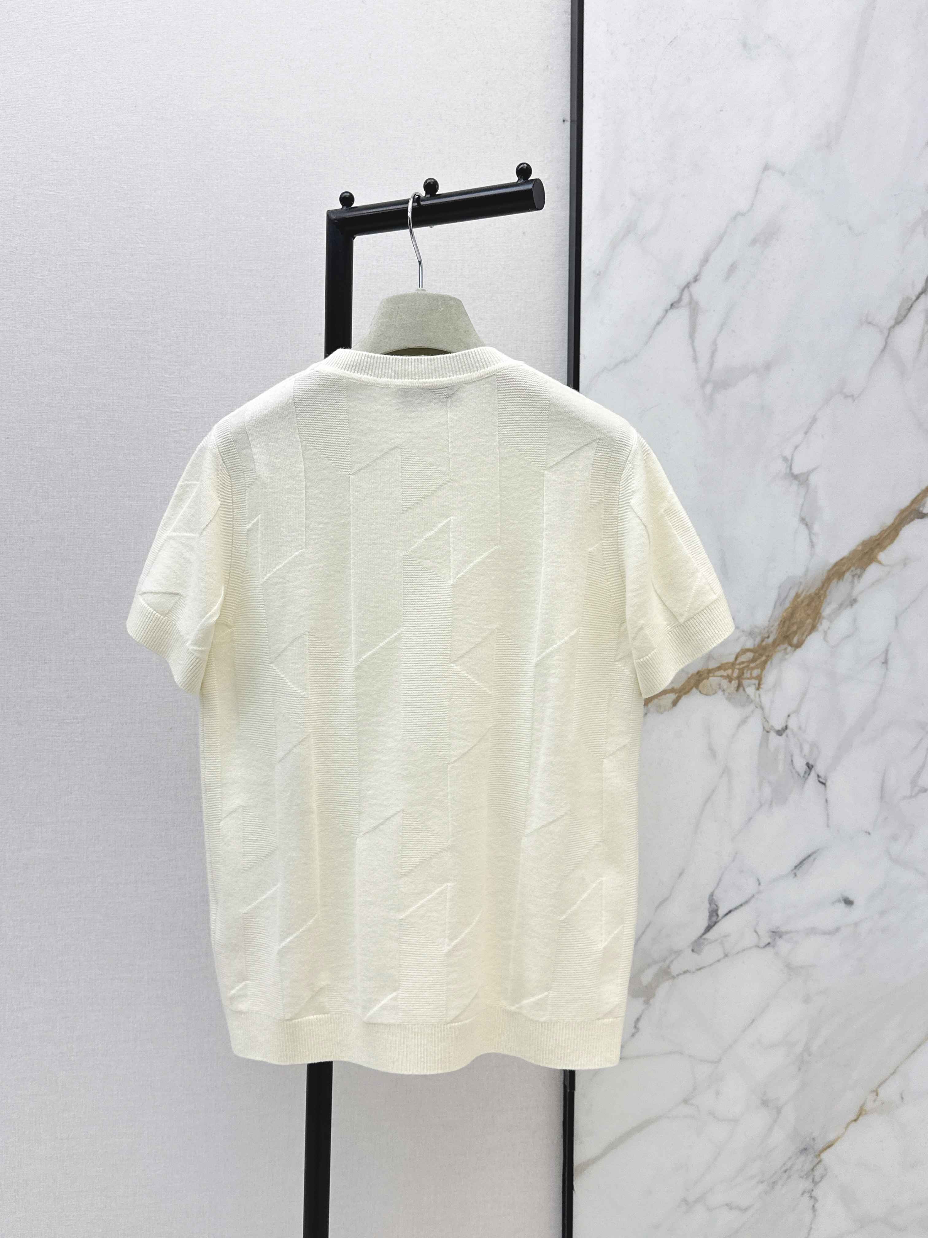 Her NEW wool sweater