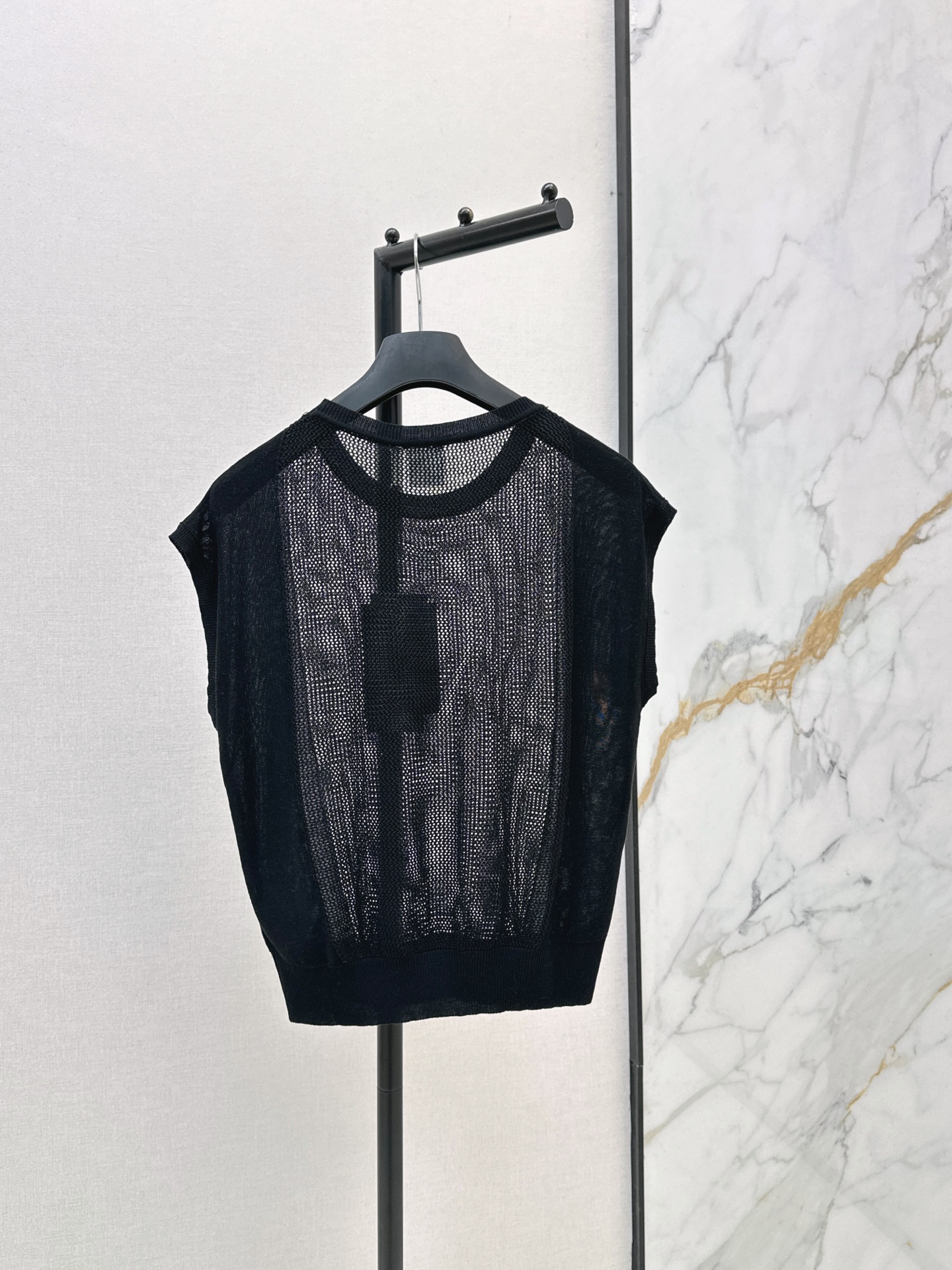 CD New Spliced hollow knitwear