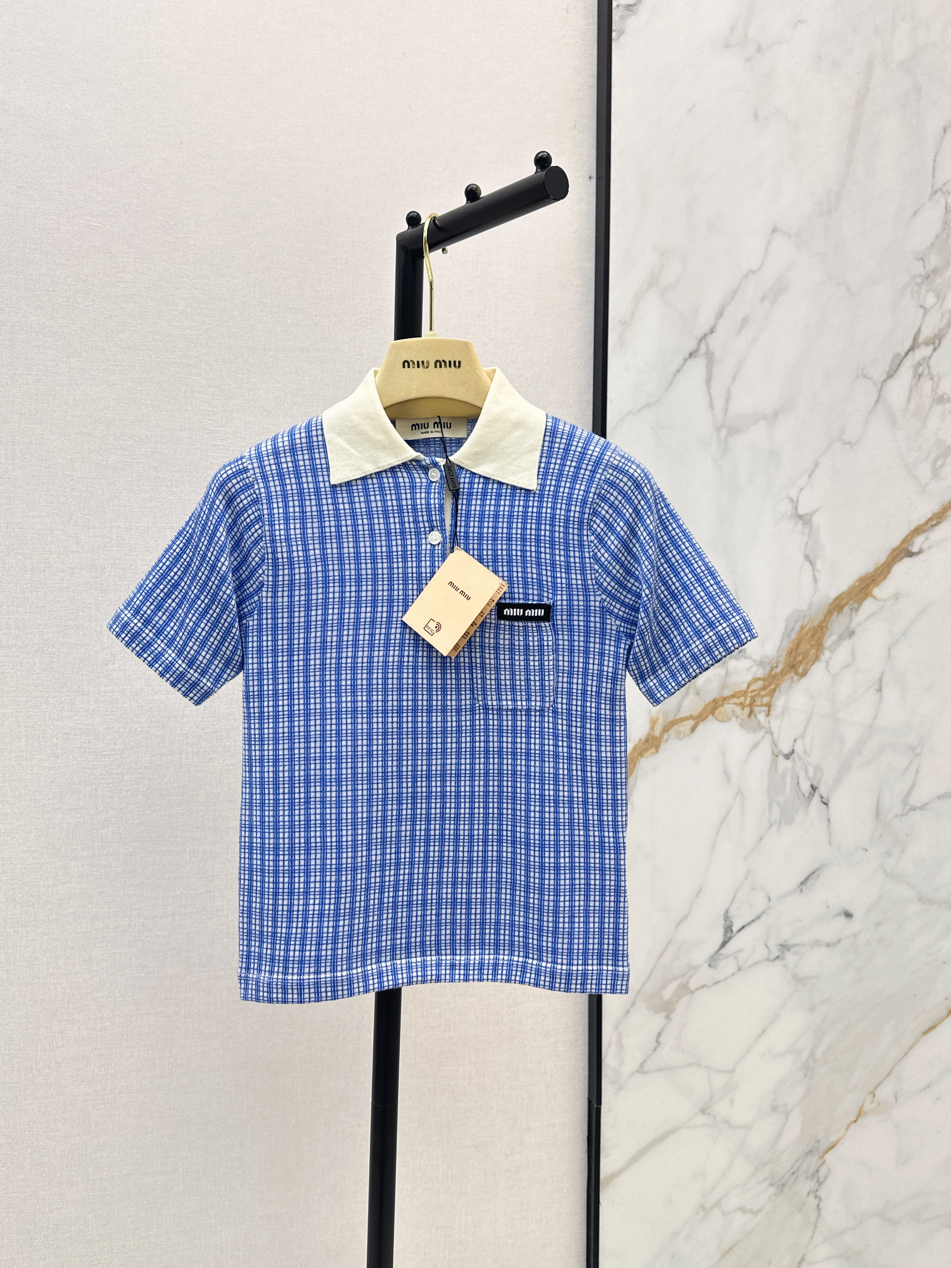 Miu New check polo knitwear