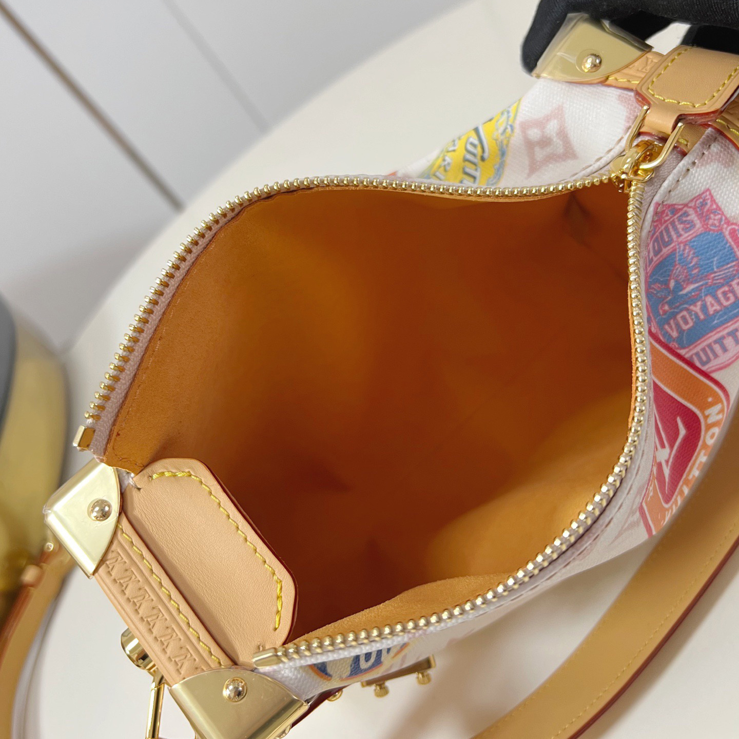 LV The Handbag Interprets Monogram Dune Elements With Retro Brushstrokes Paired With Airplane Shaped Decorations And Collage Effect Labels Luxury Bag Purse Classic Logo Women's Tramp Bag High Quality Leather Crossbody Fashion Printed Bag