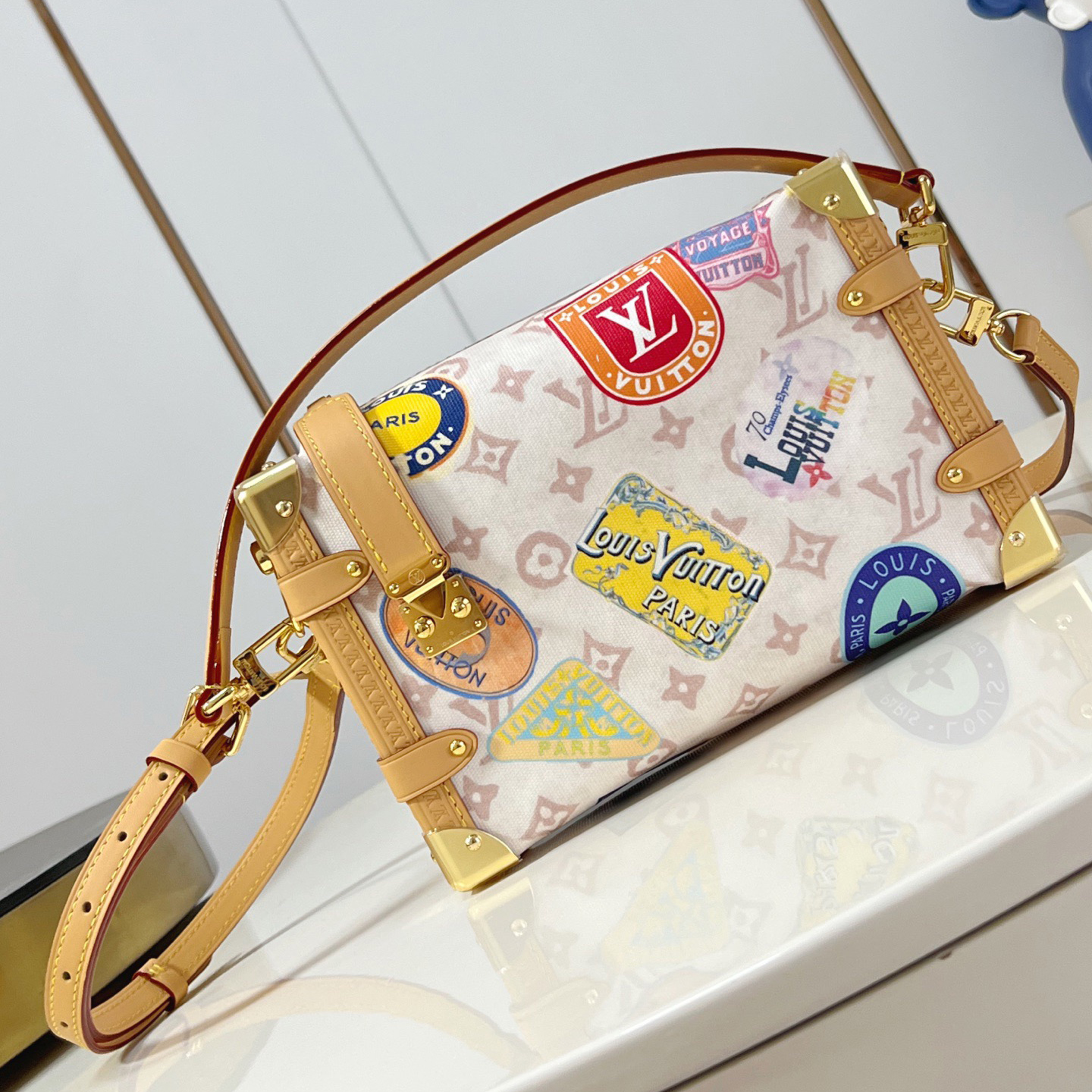 LV The Handbag Interprets Monogram Dune Elements With Retro Brushstrokes Paired With Airplane Shaped Decorations And Collage Effect Labels Luxury Bag Purse Classic Logo Women's Tramp Bag High Quality Leather Crossbody Fashion Printed Bag