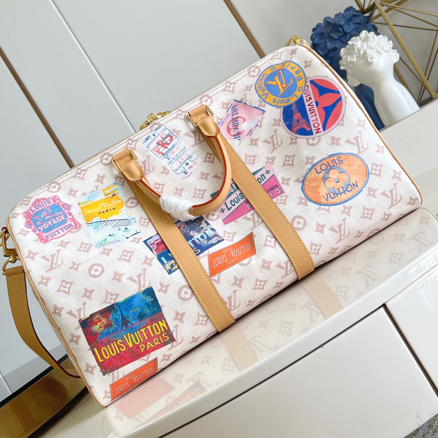 LV The Handbag Interprets Monogram Dune Elements With Retro Brushstrokes Paired With Airplane Shaped Decorations And Collage Effect Labels Luxury Bag Purse Classic Logo Women's Tramp Bag High Quality Leather Crossbody Fashion Printed Bag