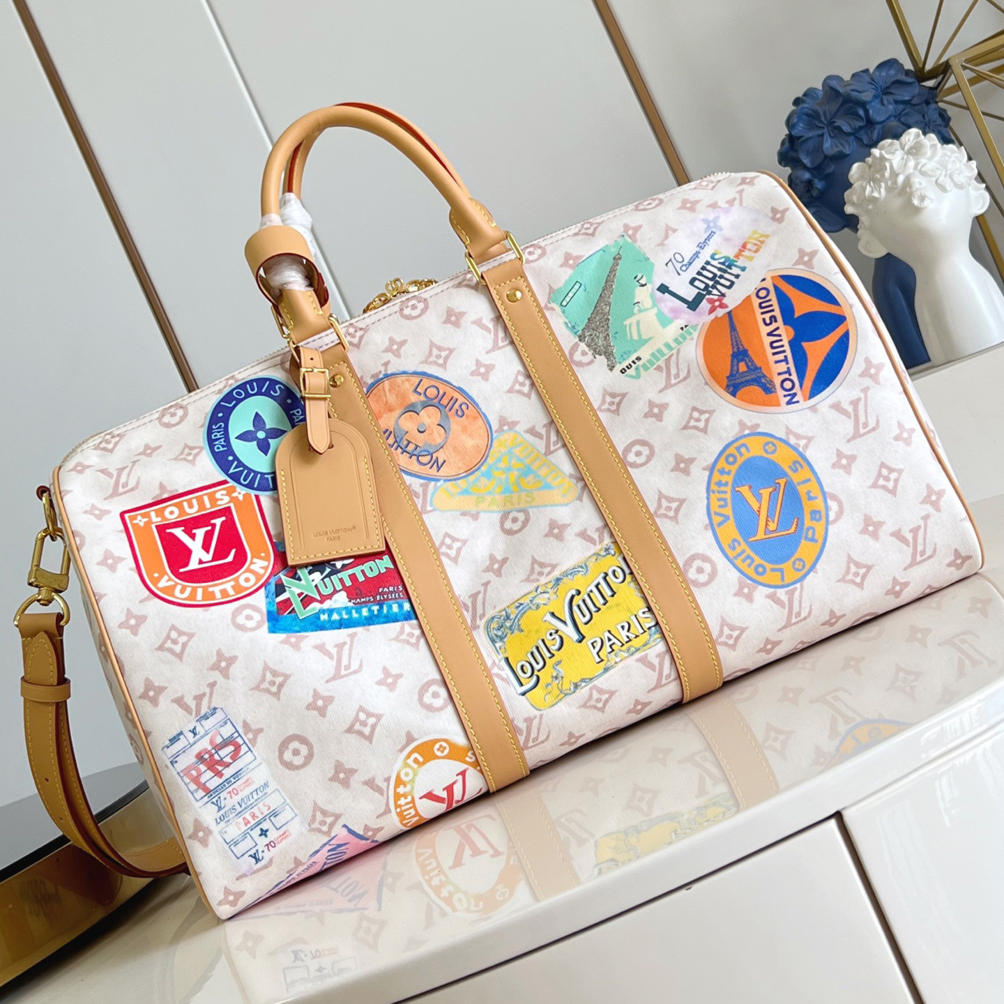 LV The Handbag Interprets Monogram Dune Elements With Retro Brushstrokes Paired With Airplane Shaped Decorations And Collage Effect Labels Luxury Bag Purse Classic Logo Women's Tramp Bag High Quality Leather Crossbody Fashion Printed Bag