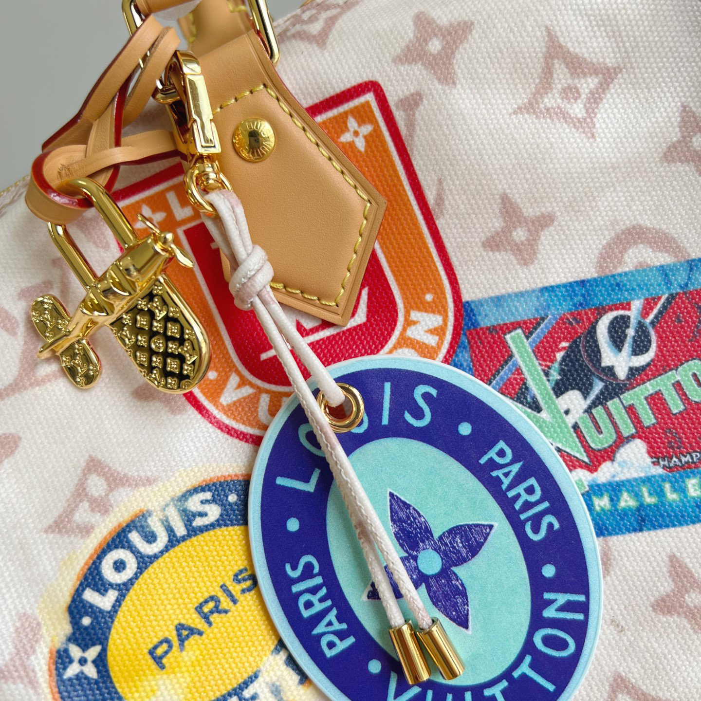 LV The Handbag Interprets Monogram Dune Elements With Retro Brushstrokes Paired With Airplane Shaped Decorations And Collage Effect Labels Luxury Bag Purse Classic Logo Women's Tramp Bag High Quality Leather Crossbody Fashion Printed Bag