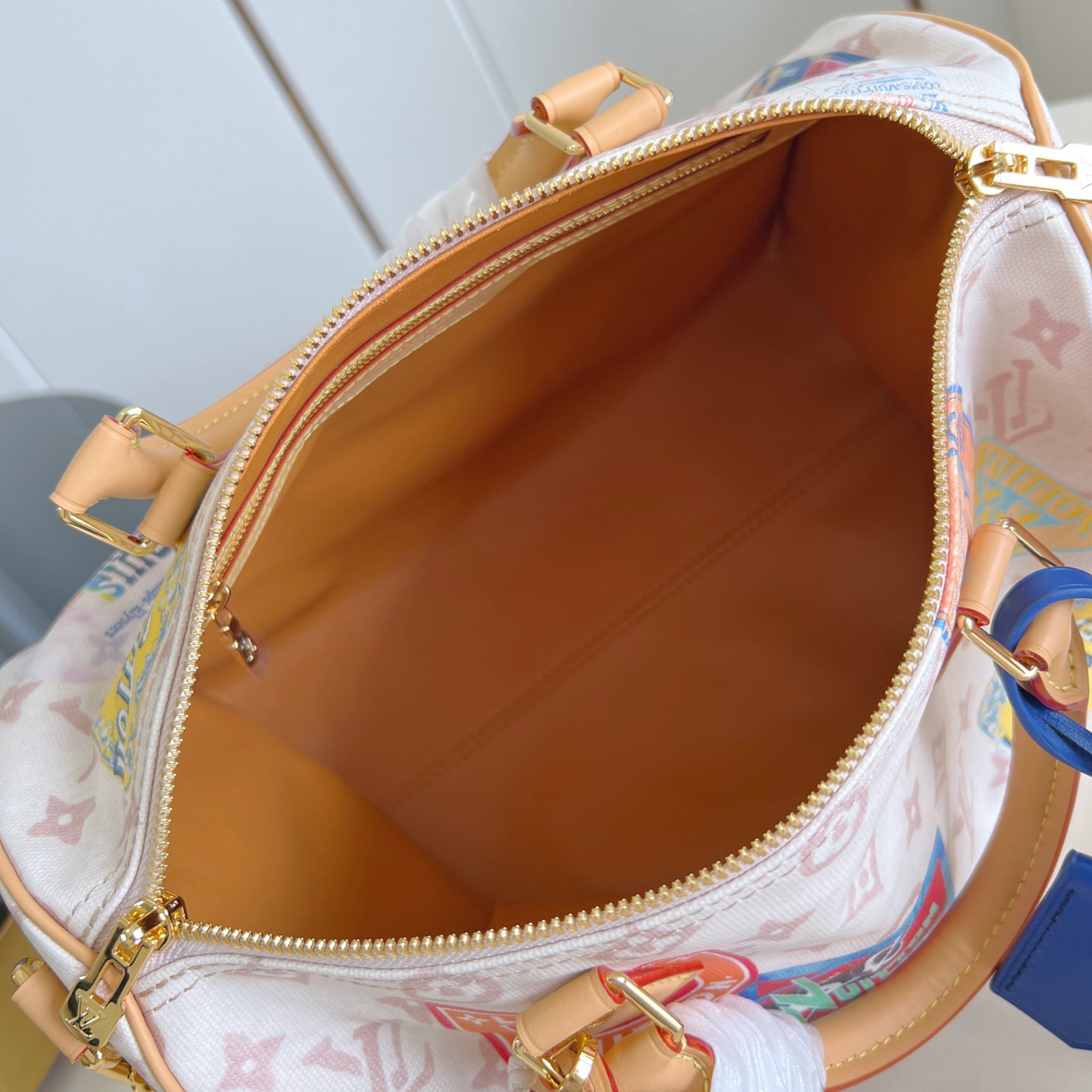 LV The Handbag Interprets Monogram Dune Elements With Retro Brushstrokes Paired With Airplane Shaped Decorations And Collage Effect Labels Luxury Bag Purse Classic Logo Women's Tramp Bag High Quality Leather Crossbody Fashion Printed Bag