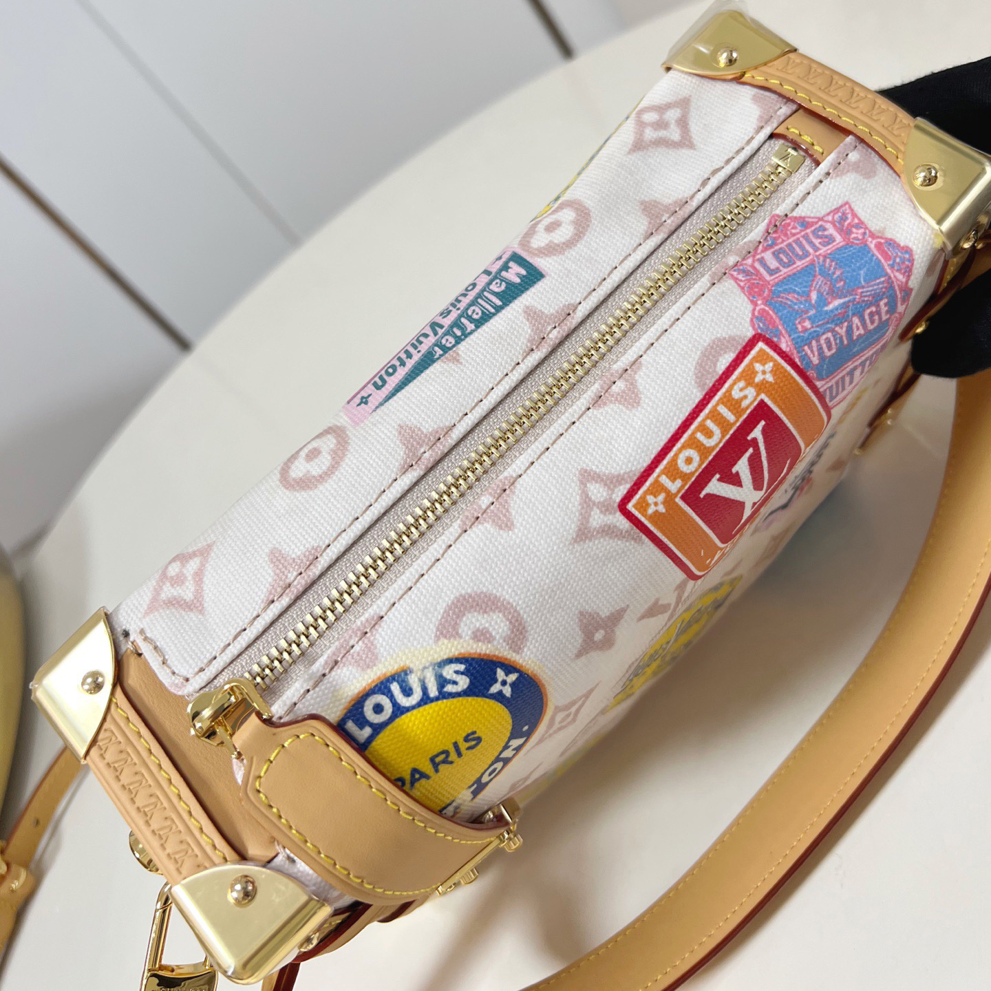 LV The Handbag Interprets Monogram Dune Elements With Retro Brushstrokes Paired With Airplane Shaped Decorations And Collage Effect Labels Luxury Bag Purse Classic Logo Women's Tramp Bag High Quality Leather Crossbody Fashion Printed Bag