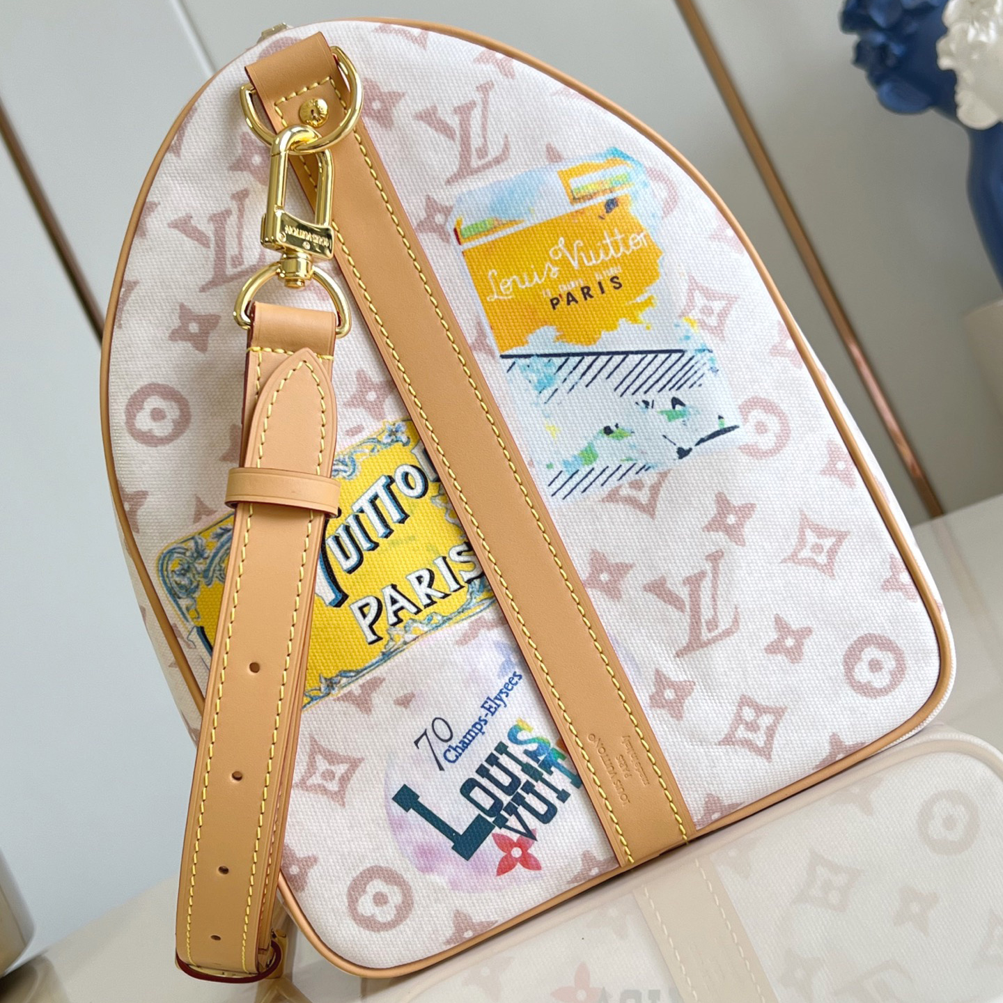 LV The Handbag Interprets Monogram Dune Elements With Retro Brushstrokes Paired With Airplane Shaped Decorations And Collage Effect Labels Luxury Bag Purse Classic Logo Women's Tramp Bag High Quality Leather Crossbody Fashion Printed Bag