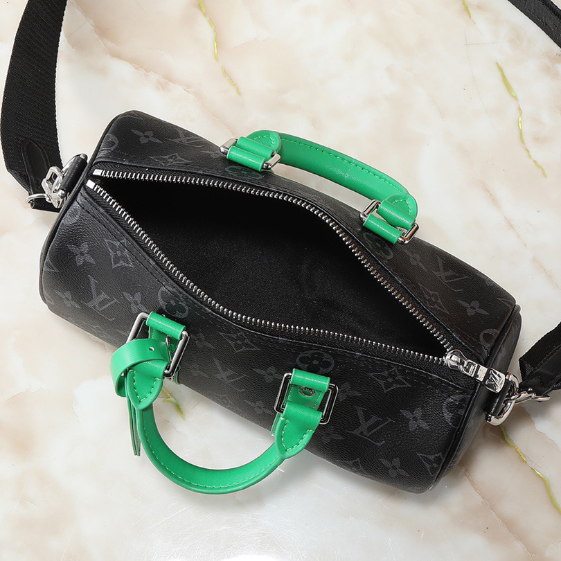 LV Designer Bag Paired With Antique Metal Parts And A Side Strap Handle Made Of Bright Leather The Compact Design Of The Brand Is Suitable For Urban Travel The Roller Handle And Detachable And Adjustable Fabric Shoulder Strap Enable Multiple Carrying