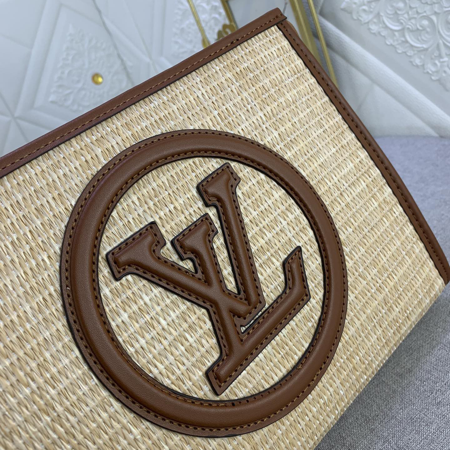 The LV High Quality Women Shoulder Bags Luxury Caramel Chain Toiletry Bag is made of natural Lafite Grass and features black leather and the Circle logo on the side Ladies Clutch Bag Shoulder Tote Female Purse Wallet Hand Bag