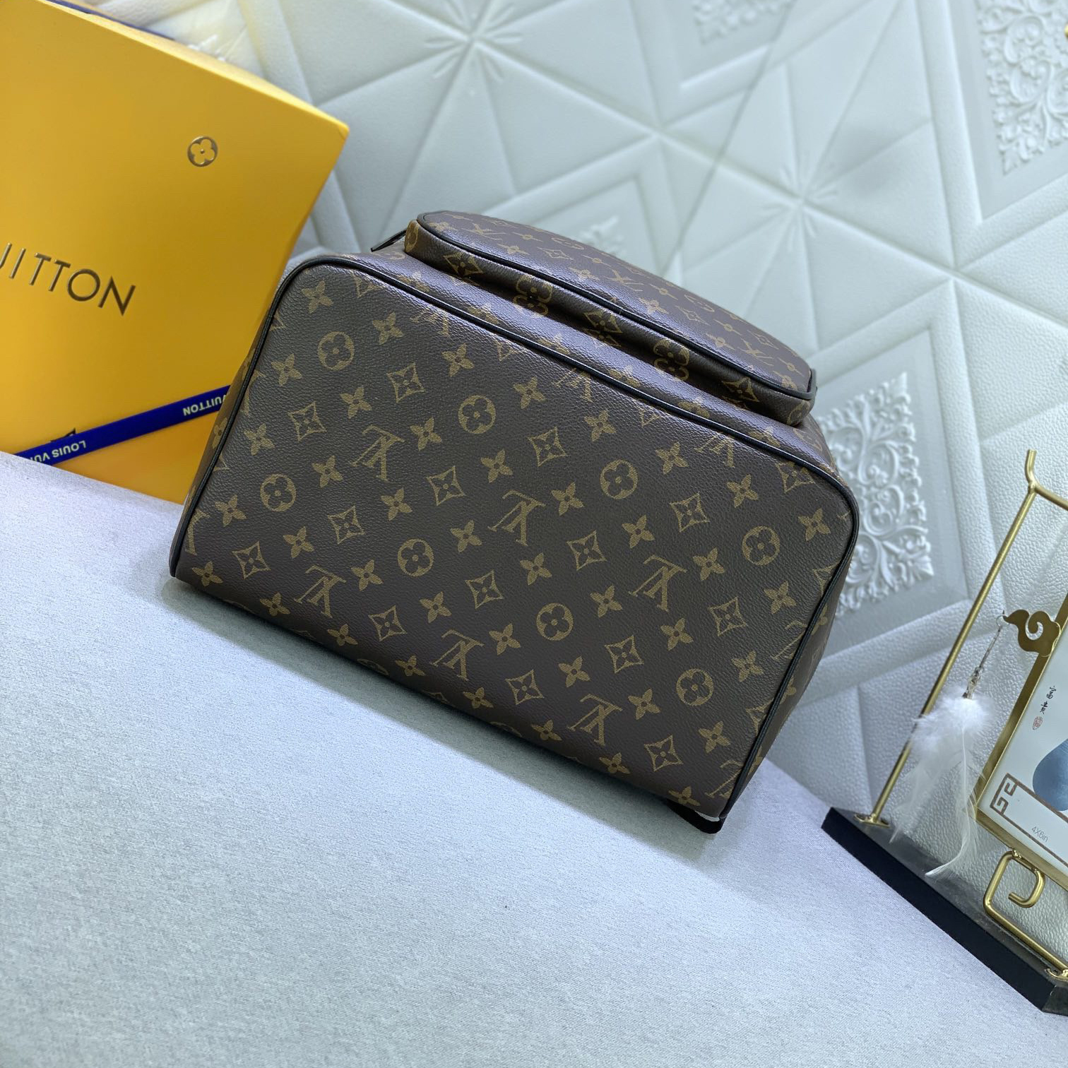 LV High Quality Unisex Backpack Luxuries Backpack Is Made Of Monogram Eclipse Canvas With Leather Trim And Features A Drawstring And Magnetic Buckle Strap For Secure Storage Adjustable Shoulder Strap Female Backpack