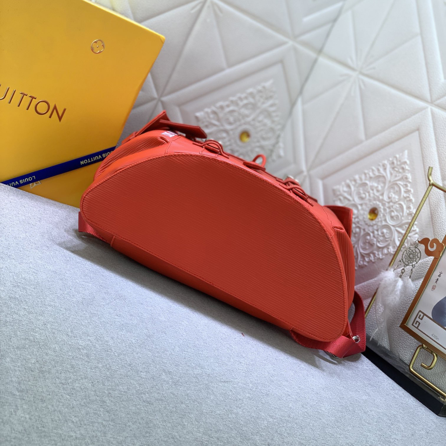 LV High Quality Unisex Backpack Luxuries Backpack Is Made Of Bright Colored Epi Xl Grain Leather Showcasing A Magnified Version Of Traditional Epi Embossing Upgrading Material Toughness And Wear Resistance LV Logo Female Backpack On The Side Bag