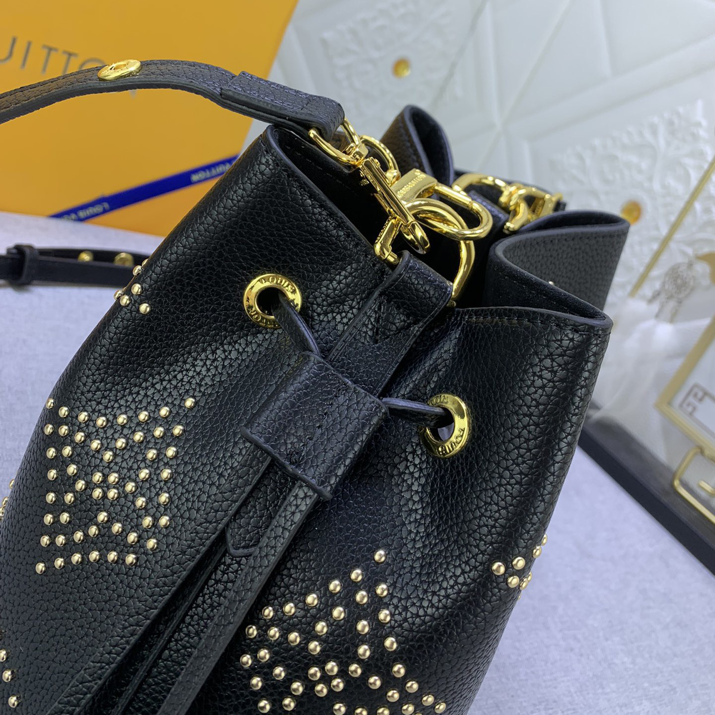 LV High Quality Women Shoulder Bags Luxury Bucket Bag Features Monogram Patterns With Decorative Studs To Securely Store Personal Items Such As Phones Keys And Wallets The Top Handle And Shoulder Strap Are Both Detachable Female Hand Bag