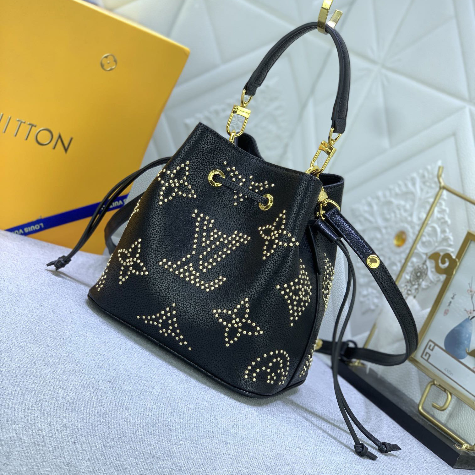 LV High Quality Women Shoulder Bags Luxury Bucket Bag Features Monogram Patterns With Decorative Studs To Securely Store Personal Items Such As Phones Keys And Wallets The Top Handle And Shoulder Strap Are Both Detachable Female Hand Bag