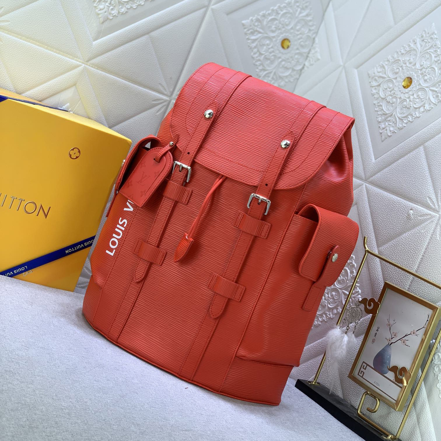LV High Quality Unisex Backpack Luxuries Backpack Is Made Of Bright Colored Epi Xl Grain Leather Showcasing A Magnified Version Of Traditional Epi Embossing Upgrading Material Toughness And Wear Resistance LV Logo Female Backpack On The Side Bag