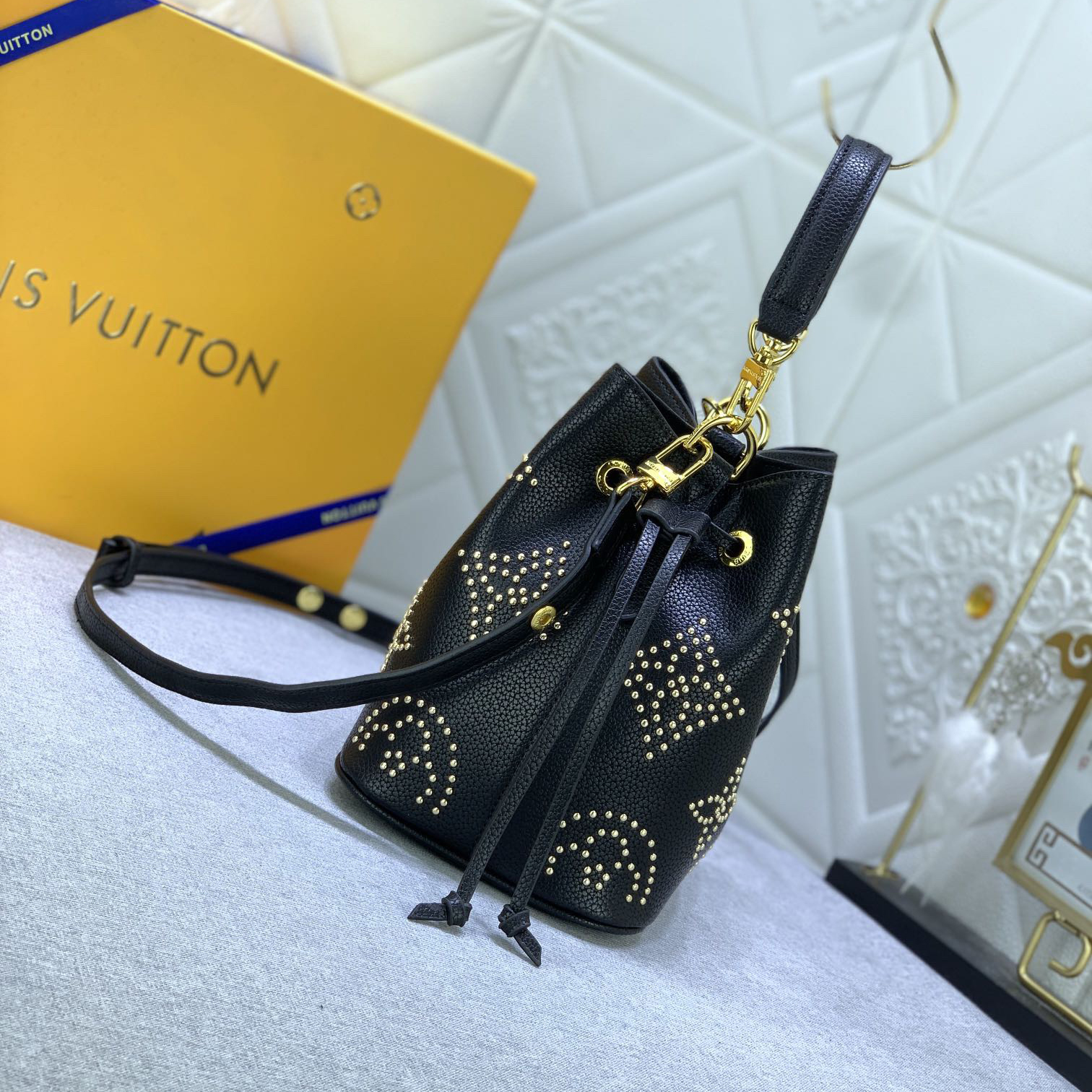 LV High Quality Women Shoulder Bags Luxury Bucket Bag Features Monogram Patterns With Decorative Studs To Securely Store Personal Items Such As Phones Keys And Wallets The Top Handle And Shoulder Strap Are Both Detachable Female Hand Bag