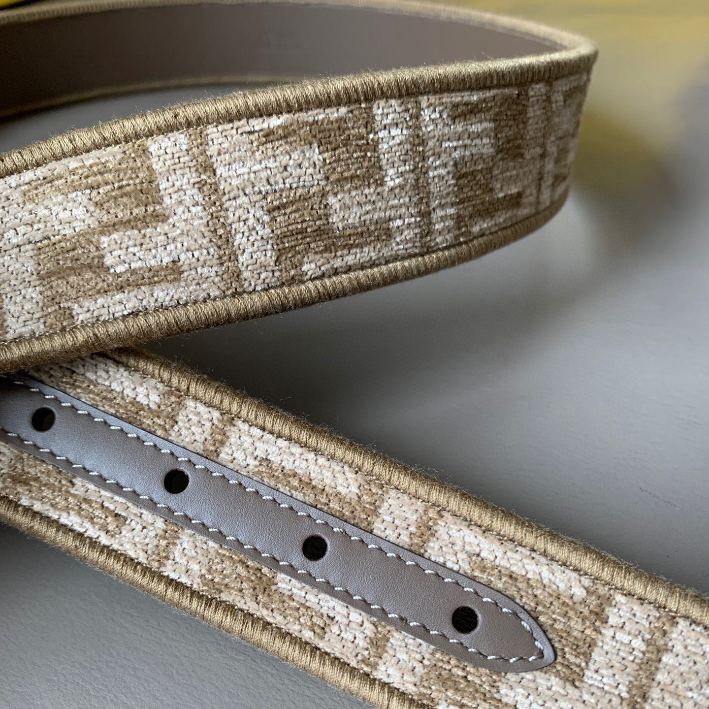 FENDI Unisex Pigeon Grey Fabric Material Decorated With White Jacquard Ff Pattern Beige Leather Details Golden Finished Metal Piece With A Width Of 3.5cm