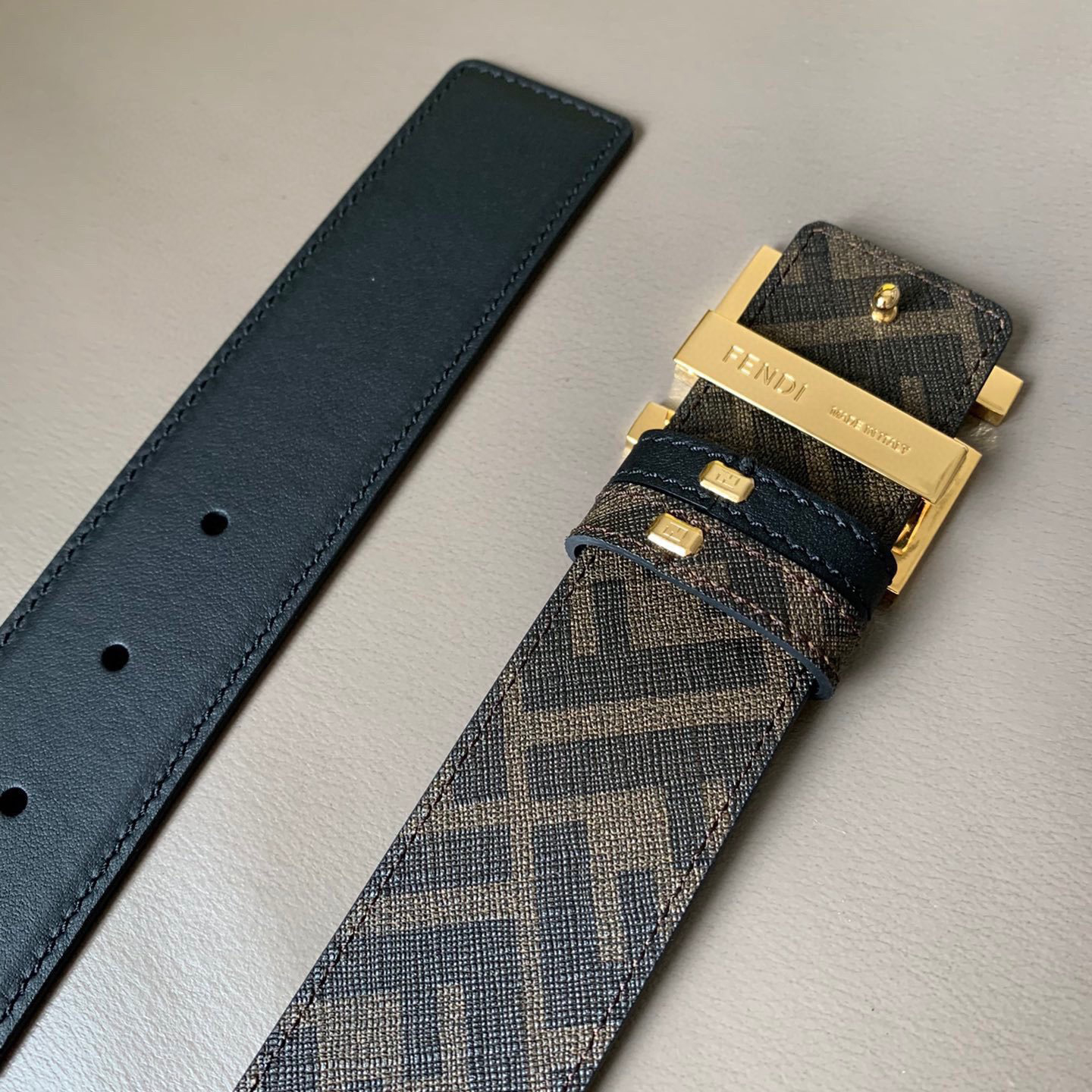 FENDI Men's Double-Sided Belt Ff Nail Buckle Black Cuoio Romano Cowhide Material Tobacco Yellow And Black  FF Pattern Fabric Lining Brushed Gold Finish Metal Parts