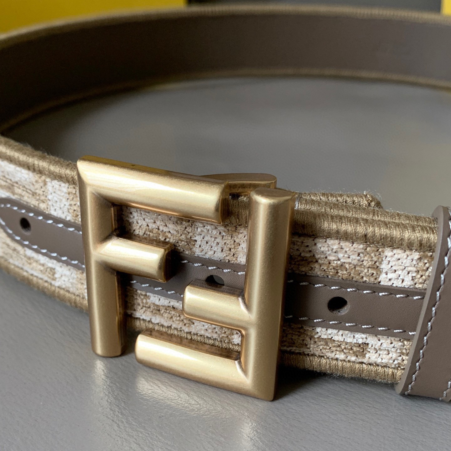 FENDI Unisex Pigeon Grey Fabric Material Decorated With White Jacquard Ff Pattern Beige Leather Details Golden Finished Metal Piece With A Width Of 3.5cm