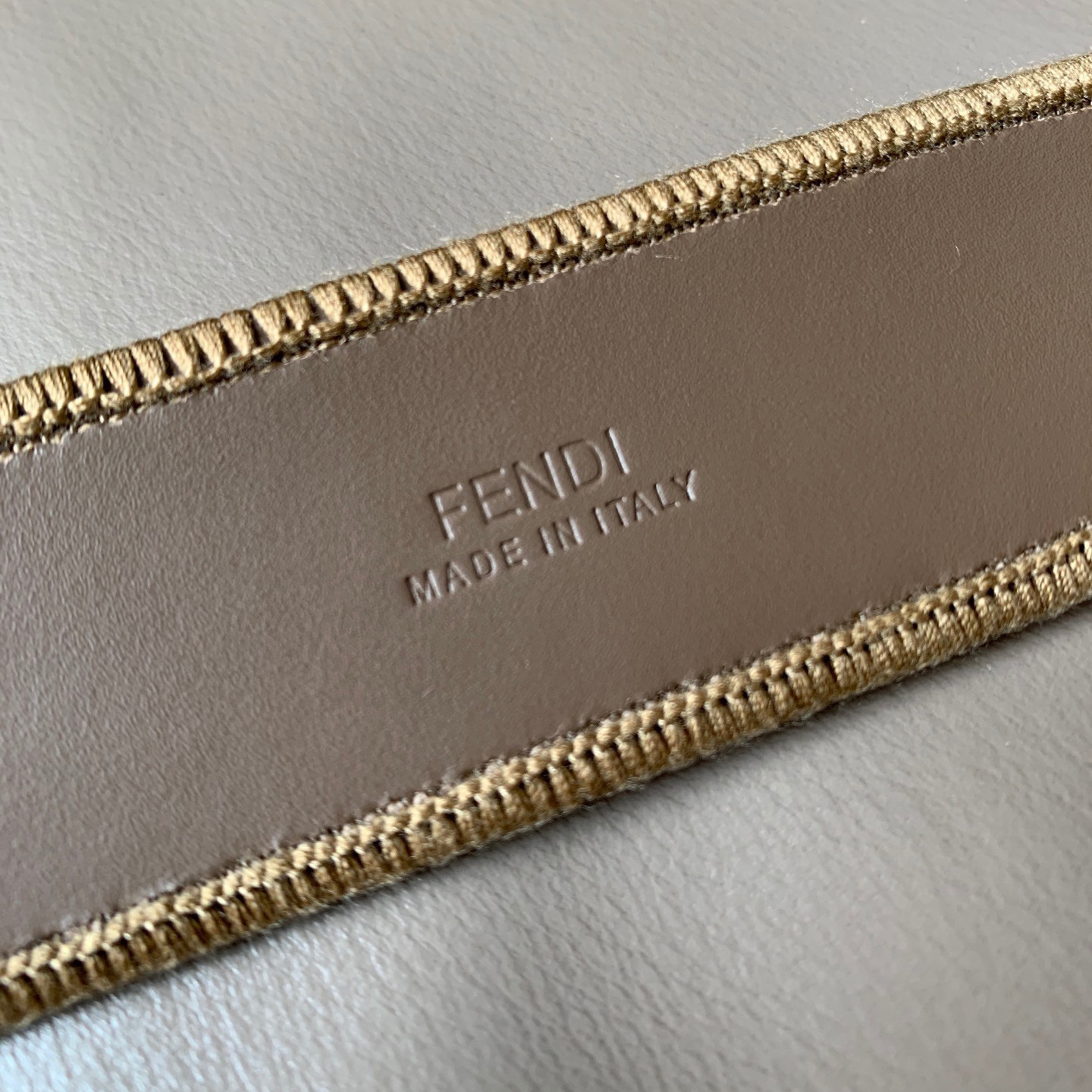 FENDI Unisex Pigeon Grey Fabric Material Decorated With White Jacquard Ff Pattern Beige Leather Details Golden Finished Metal Piece With A Width Of 3.5cm