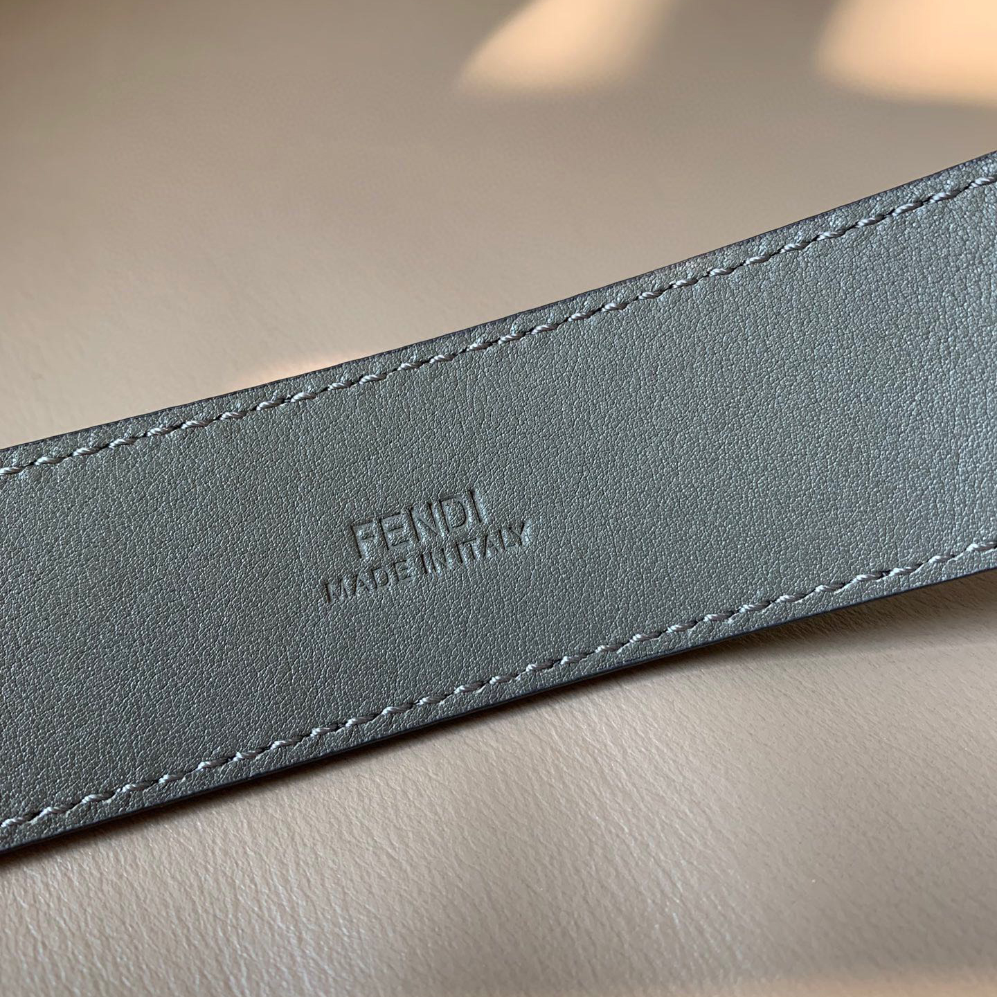 FENDI Men's Casual Needle Buckle Width 3.5cm Belt Comes with Two Belt Rings, One Adorned with Metal Nameplate and Engraved with FF Pattern Two tone Design Black Cuoio Romano Leather Material Gray Calf Inner Lining