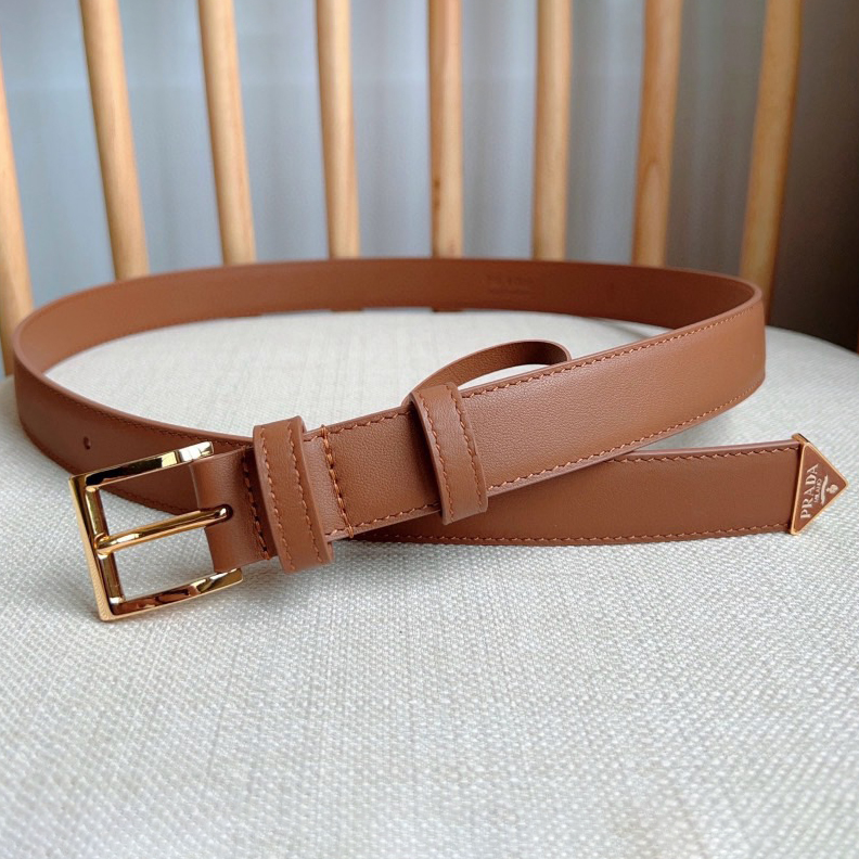 Prada Belts For Women Designer Belt Exudes A Simple Yet Exquisite Elegance The Enamel Coated Metal Triangle Logo At The Tip Showcases Its Iconic Design And Is An Ideal Accessory For Ada's Women's Ready To Wear Collection Measuring 2.5cm In Width