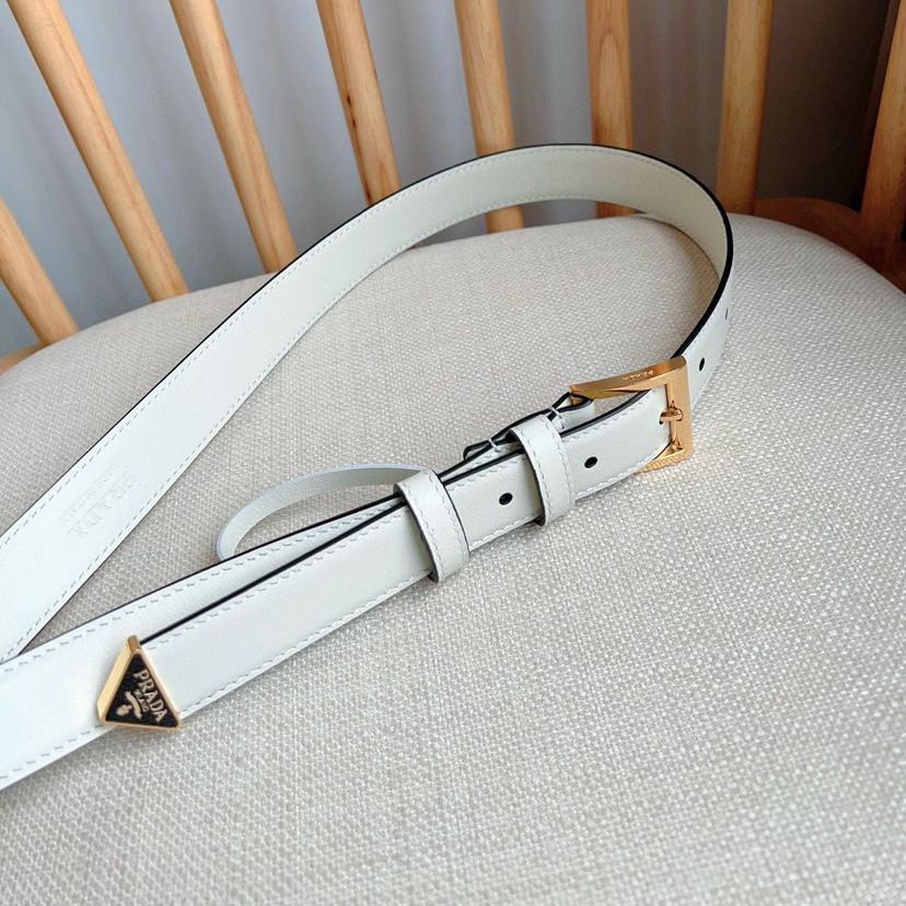 Prada Belts For Women Designer Belt Exudes A Simple Yet Exquisite Elegance The Enamel Coated Metal Triangle Logo At The Tip Showcases Its Iconic Design And Is An Ideal Accessory For Ada's Women's Ready To Wear Collection Measuring 2.5cm In Width