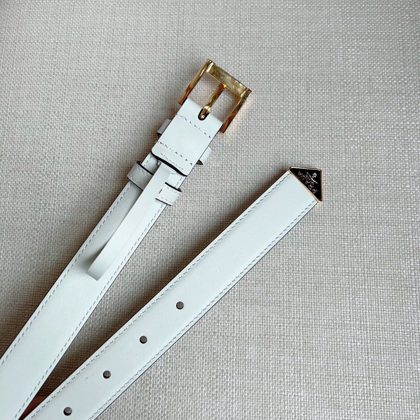 Prada Belts For Women Designer Belt Exudes A Simple Yet Exquisite Elegance The Enamel Coated Metal Triangle Logo At The Tip Showcases Its Iconic Design And Is An Ideal Accessory For Ada's Women's Ready To Wear Collection Measuring 2.5cm In Width