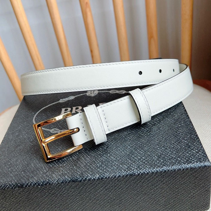 Prada Belts For Women Designer Belt Exudes A Simple Yet Exquisite Elegance The Enamel Coated Metal Triangle Logo At The Tip Showcases Its Iconic Design And Is An Ideal Accessory For Ada's Women's Ready To Wear Collection Measuring 2.5cm In Width