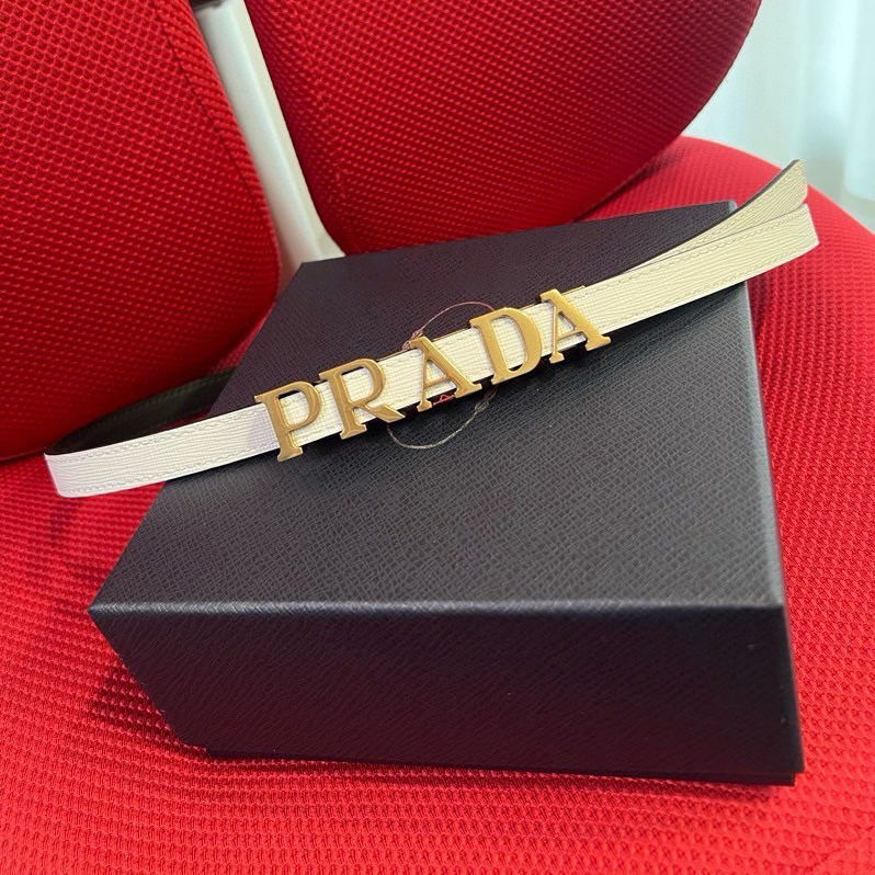 Prada Women's Brand Belt Women's High End Fashion Personalized Casual Women's Belt Saffron Imported Head Layer Cross Pattern With A Width Of 1.5cm And With Box