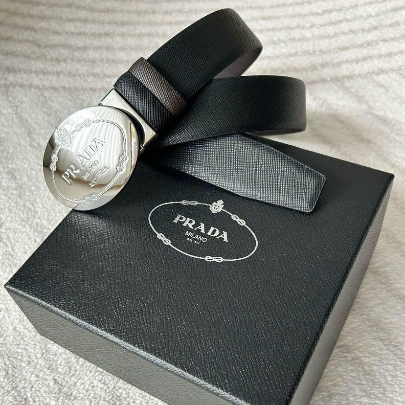 Prada Men's Business And Leisure Double Sided Belt Width 3.4cm Made Of Double Sided Saffiano Black With Coffee Head Leather Prada Logo Engraved In Elliptical Polished Steel Metal Buckle Contrasting Color Belt Loop Exquisite And Elegant