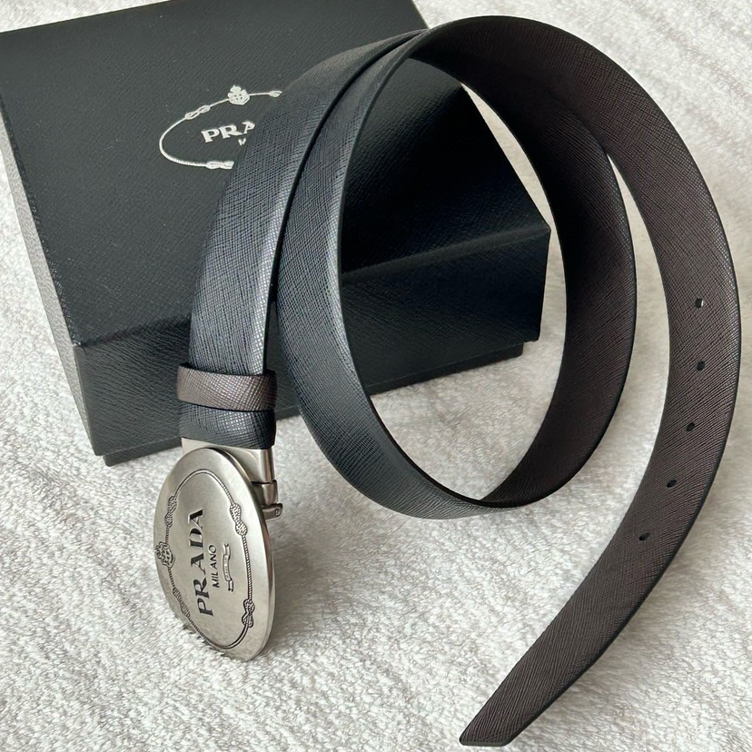 Prada Men's Business And Leisure Double Sided Belt Width 3.4cm Made Of Double Sided Saffiano Black With Coffee Head Leather Prada Logo Engraved In Elliptical Polished Steel Metal Buckle Contrasting Color Belt Loop Exquisite And Elegant
