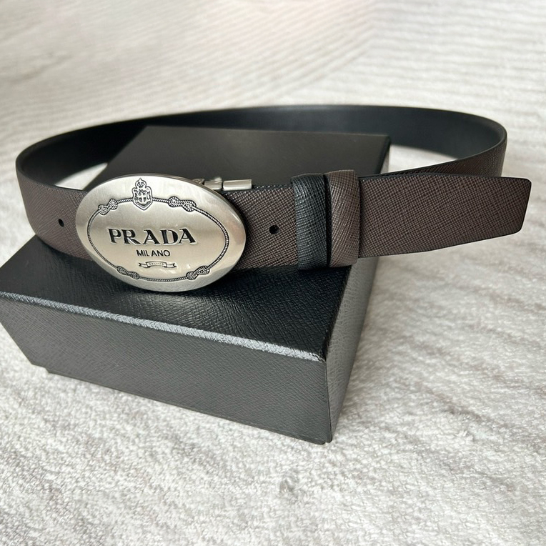 Prada Men's Business And Leisure Double Sided Belt Width 3.4cm Made Of Double Sided Saffiano Black With Coffee Head Leather Prada Logo Engraved In Elliptical Polished Steel Metal Buckle Contrasting Color Belt Loop Exquisite And Elegant