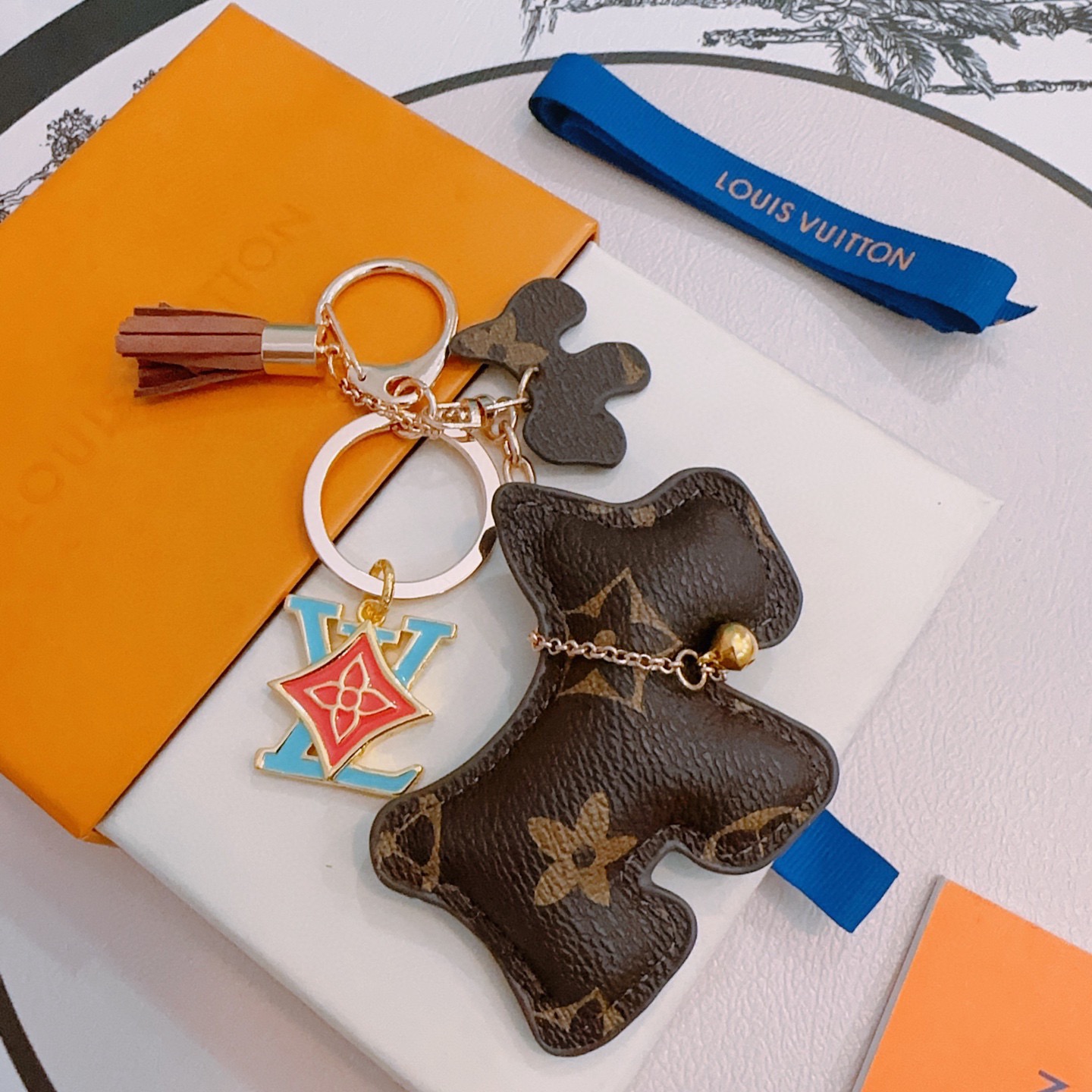 LV Luxury Brand Men's And Women's Style Classic Key Chain Cute Mini Pony Bag Pendant Hand Sewn Sheepskin Angel Pegasus Modeling Design Fashion Pendant Decor Key Chain Best Gift