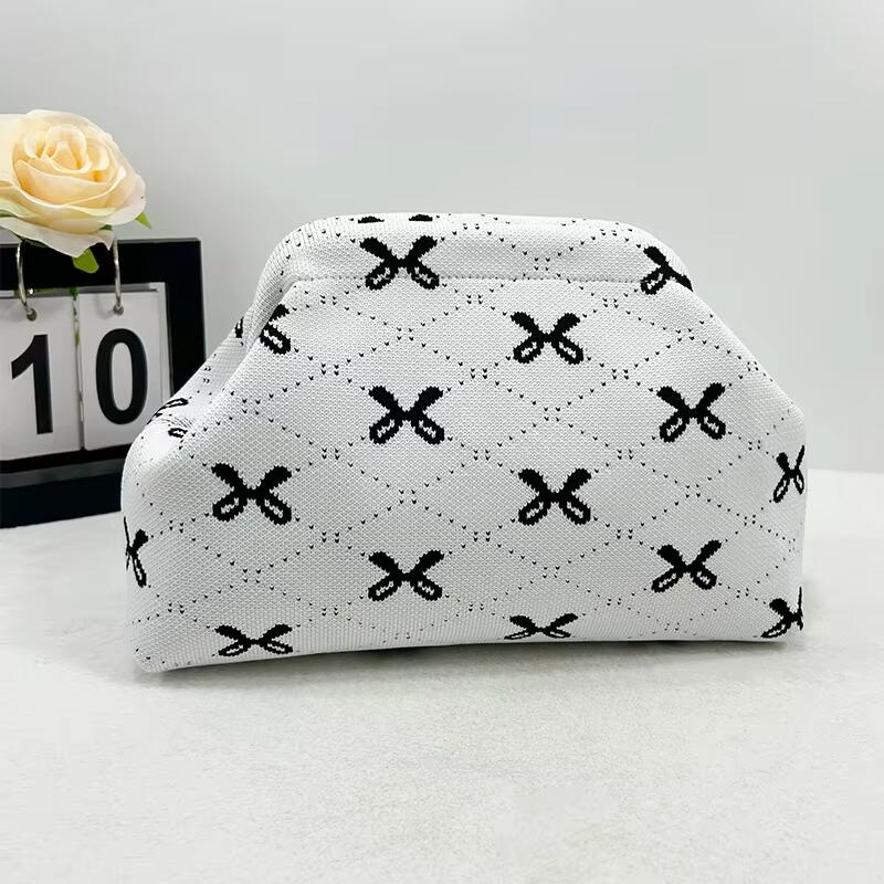 Custom Logo New Women's Striped Knit Handbag For Commuting Chic And Versatile Cloud Design Woven Cosmetic Bag