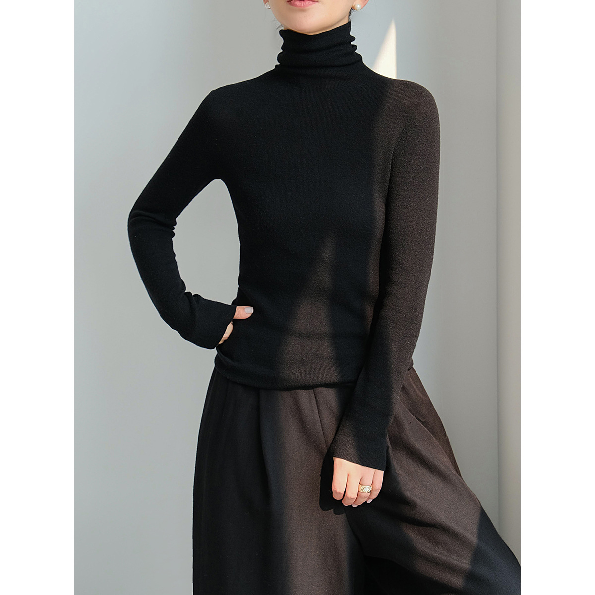 Women's high-neck black long-sleeved top