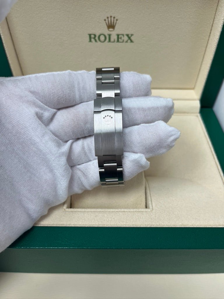 Rolex Oyster Perpetual 31 Domed Bezel Blue Index Dial Oyster Bracelet (Ref# 277200)