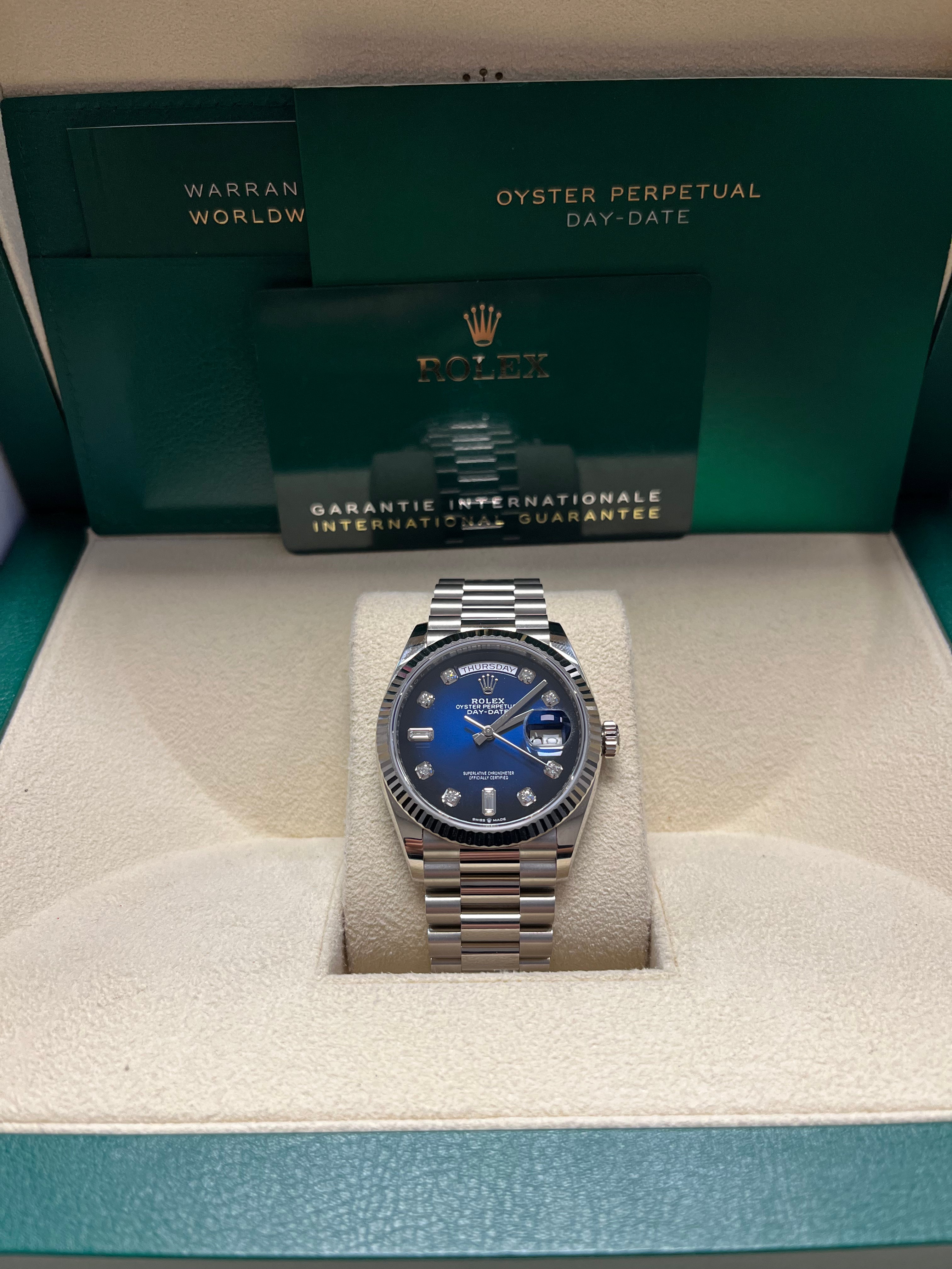 Rolex White Gold Day-Date 36 Watch - Fluted Bezel - Blue Ombre�� Diamond Dial - President Bracelet (Ref # 128239)