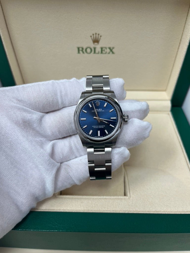 Rolex Oyster Perpetual 31 Domed Bezel Blue Index Dial Oyster Bracelet (Ref# 277200)