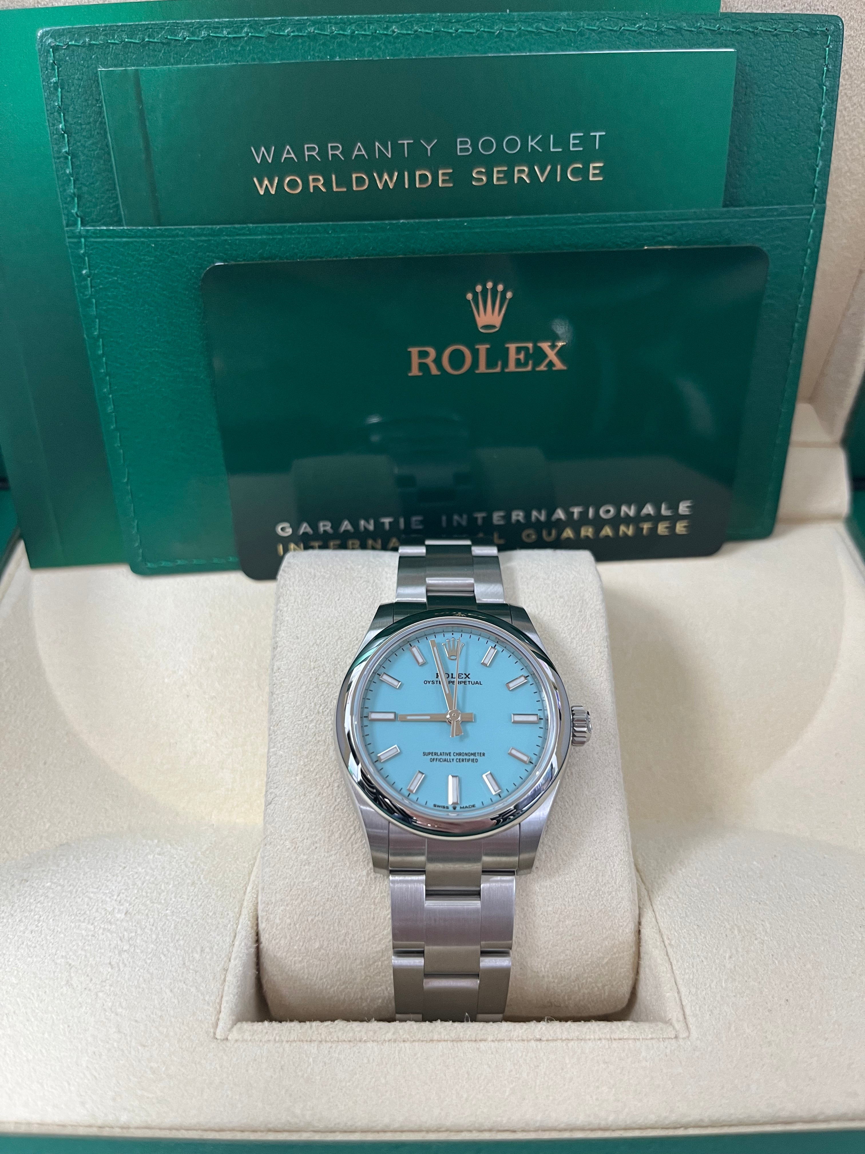 Rolex Oyster Perpetual 31 Domed Bezel Turquoise Blue Index Dial Oyster Bracelet 277200